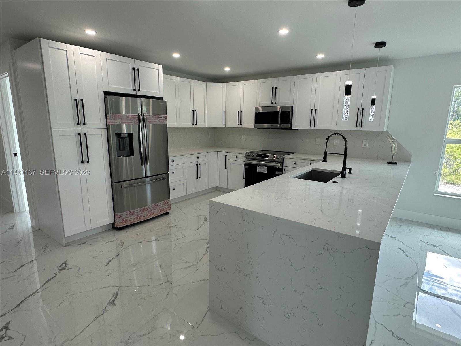 1125 MILWAUKEE BLVD, LEHIGH ACRES, FL, 33974