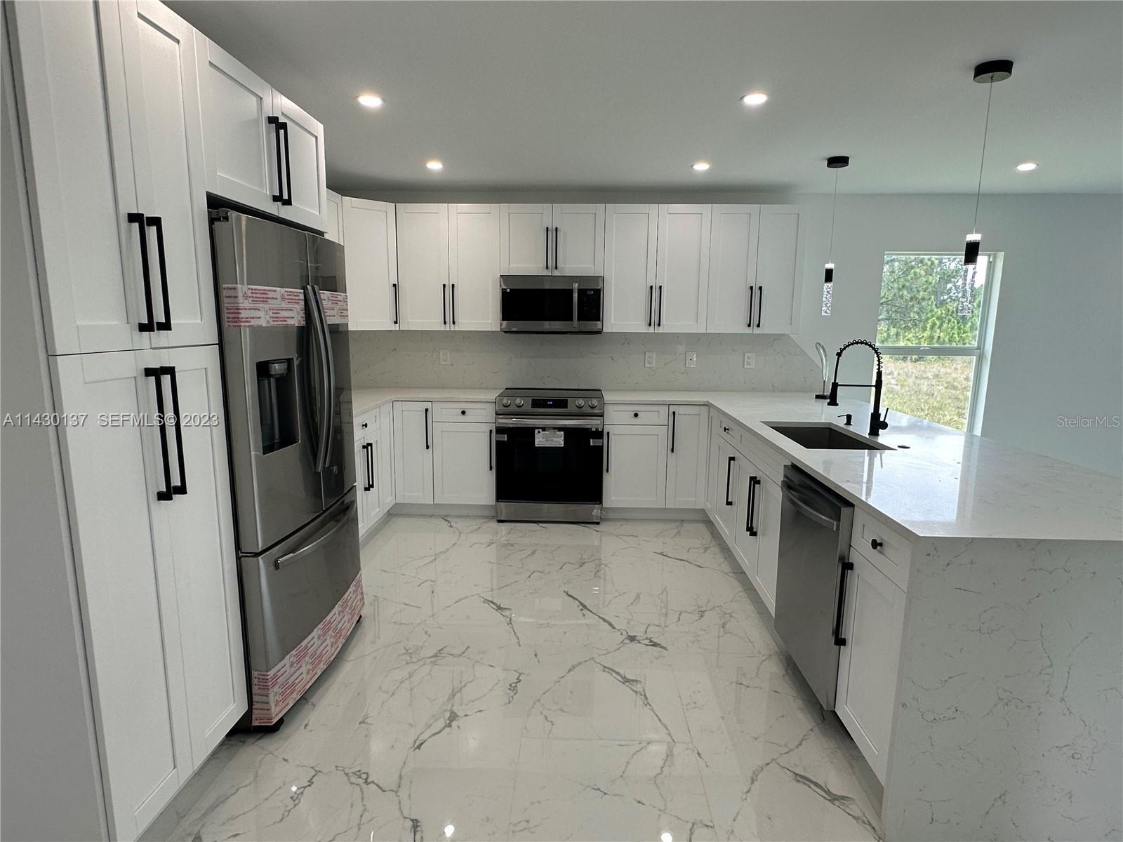 1125 MILWAUKEE BLVD, LEHIGH ACRES, FL, 33974