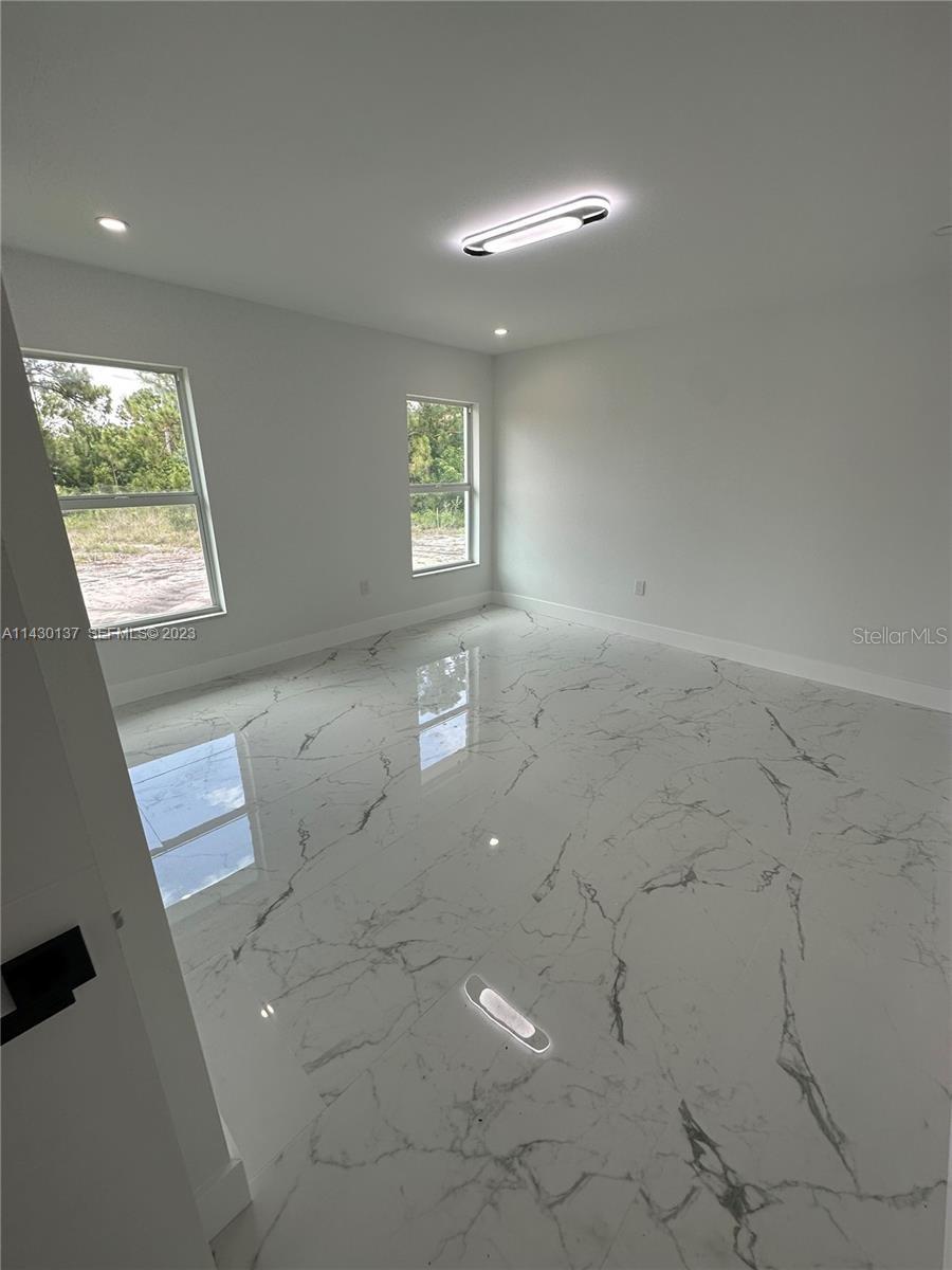 1125 MILWAUKEE BLVD, LEHIGH ACRES, FL, 33974