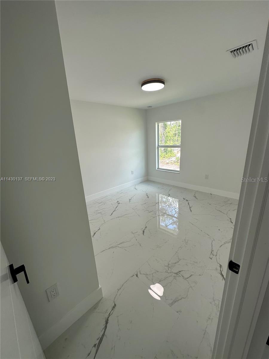 1125 MILWAUKEE BLVD, LEHIGH ACRES, FL, 33974