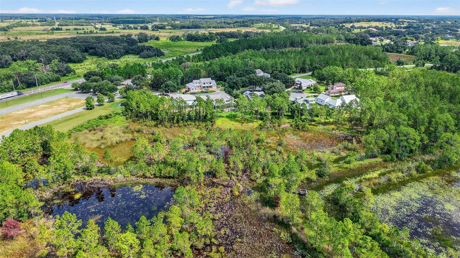 404 LONG AND WINDING RD, HOWEY IN THE HILLS, FL, 34737