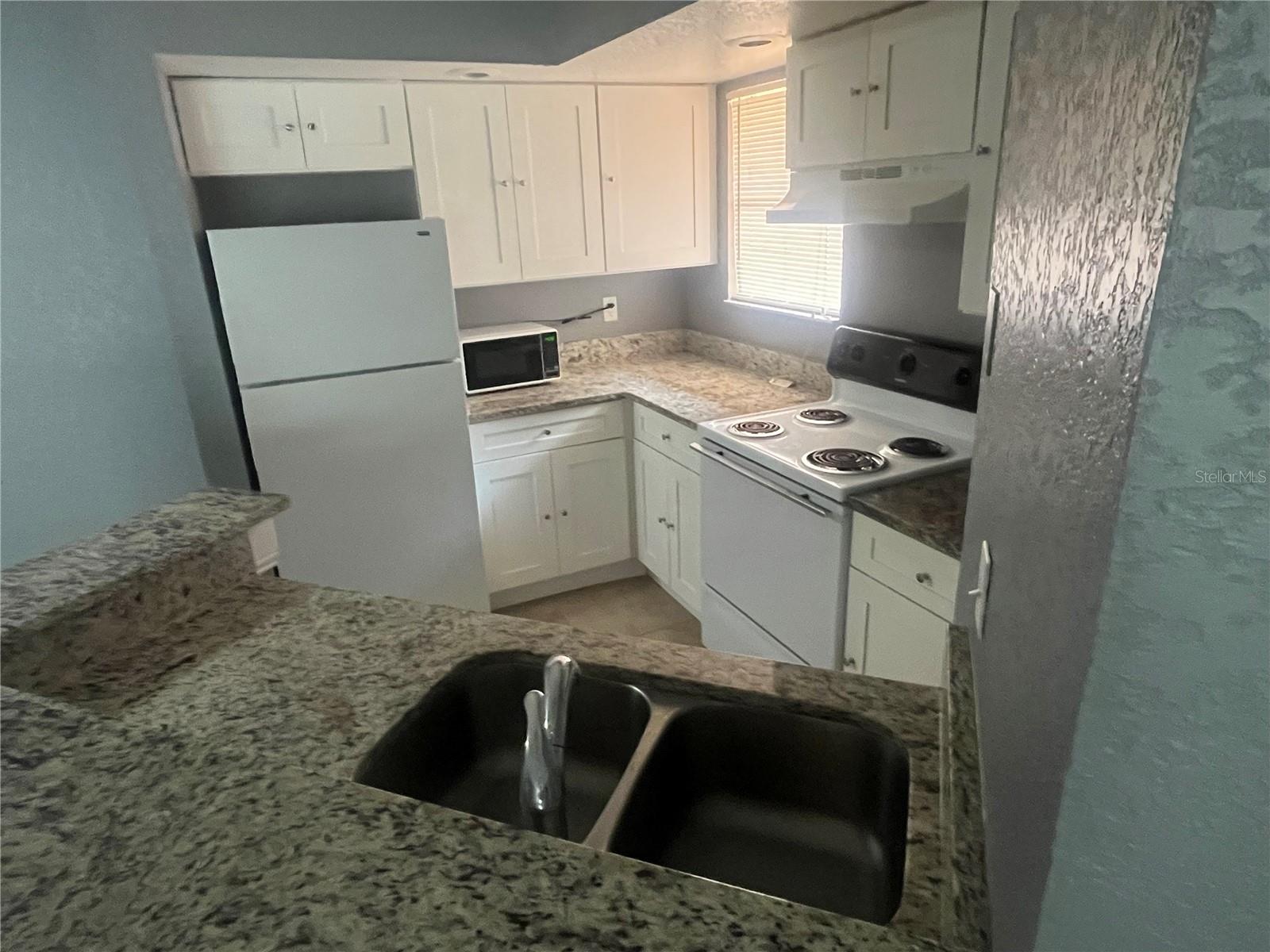 4548 COMMANDER DR #1412, ORLANDO, FL, 32822