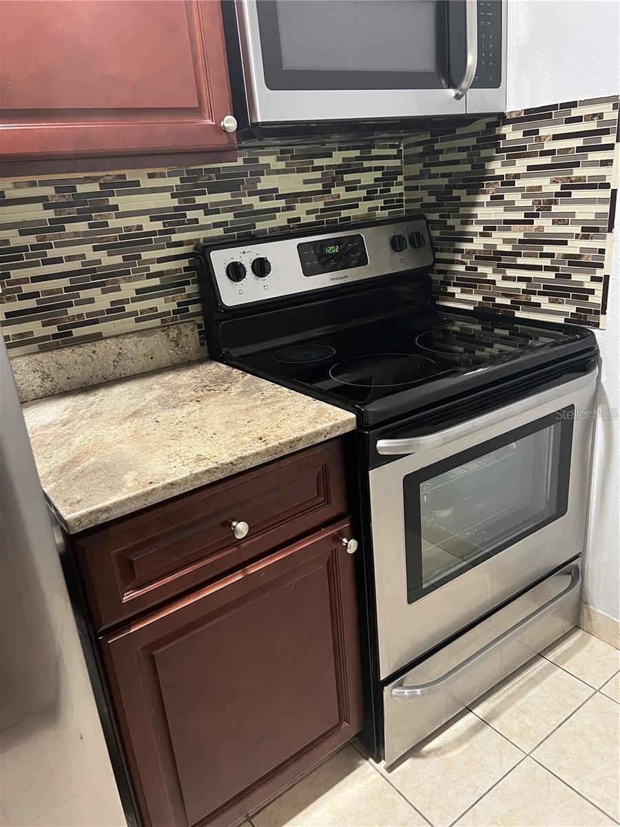 8643 MALLARD RESERVE DR #202, TAMPA, FL, 33614