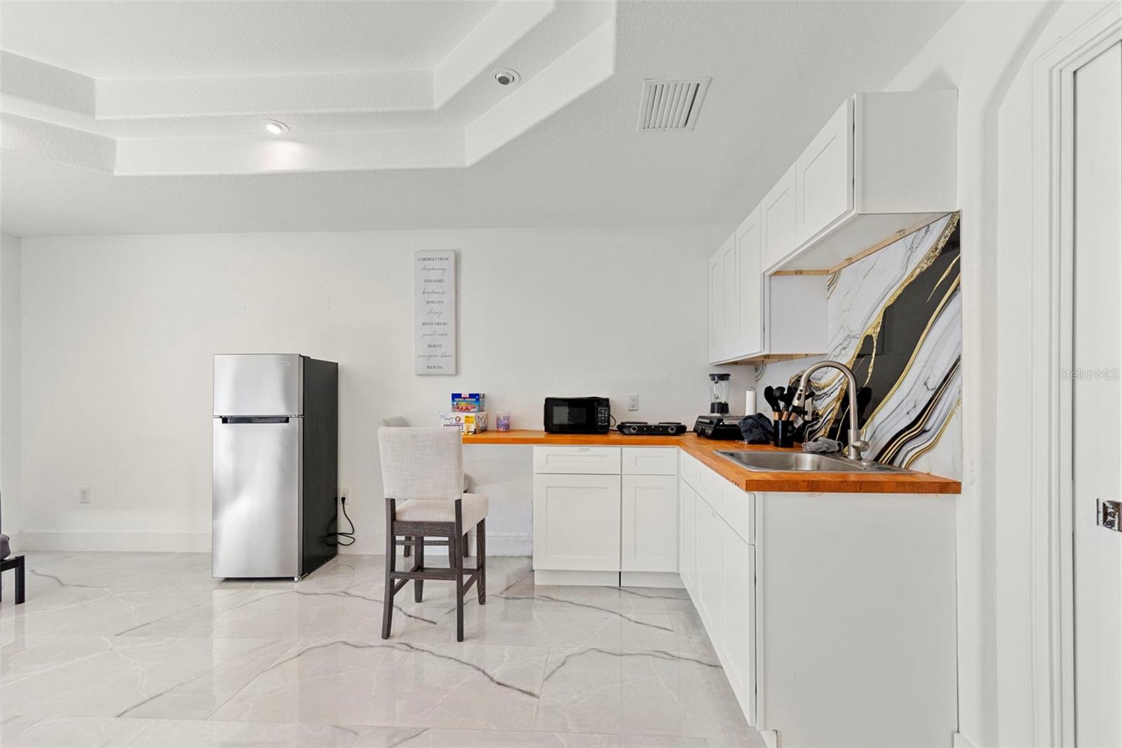 8019 N GOMEZ AVE, TAMPA, FL, 33614