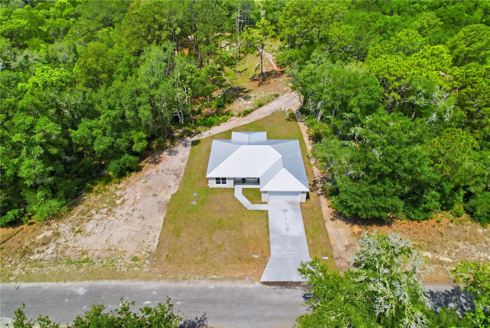 124 GUAVA TER, OCKLAWAHA, FL, 32179