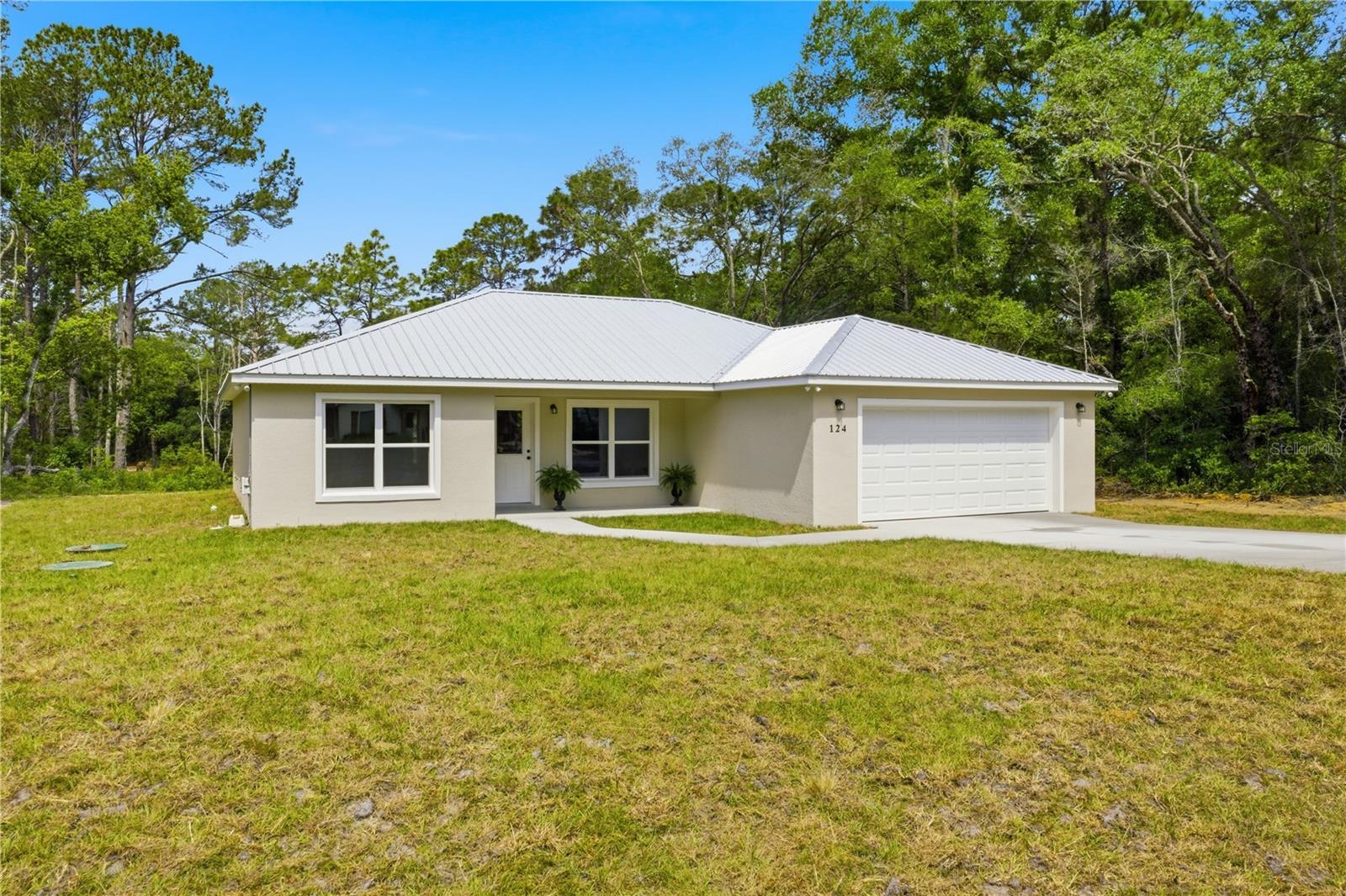 124 GUAVA TER, OCKLAWAHA, FL, 32179