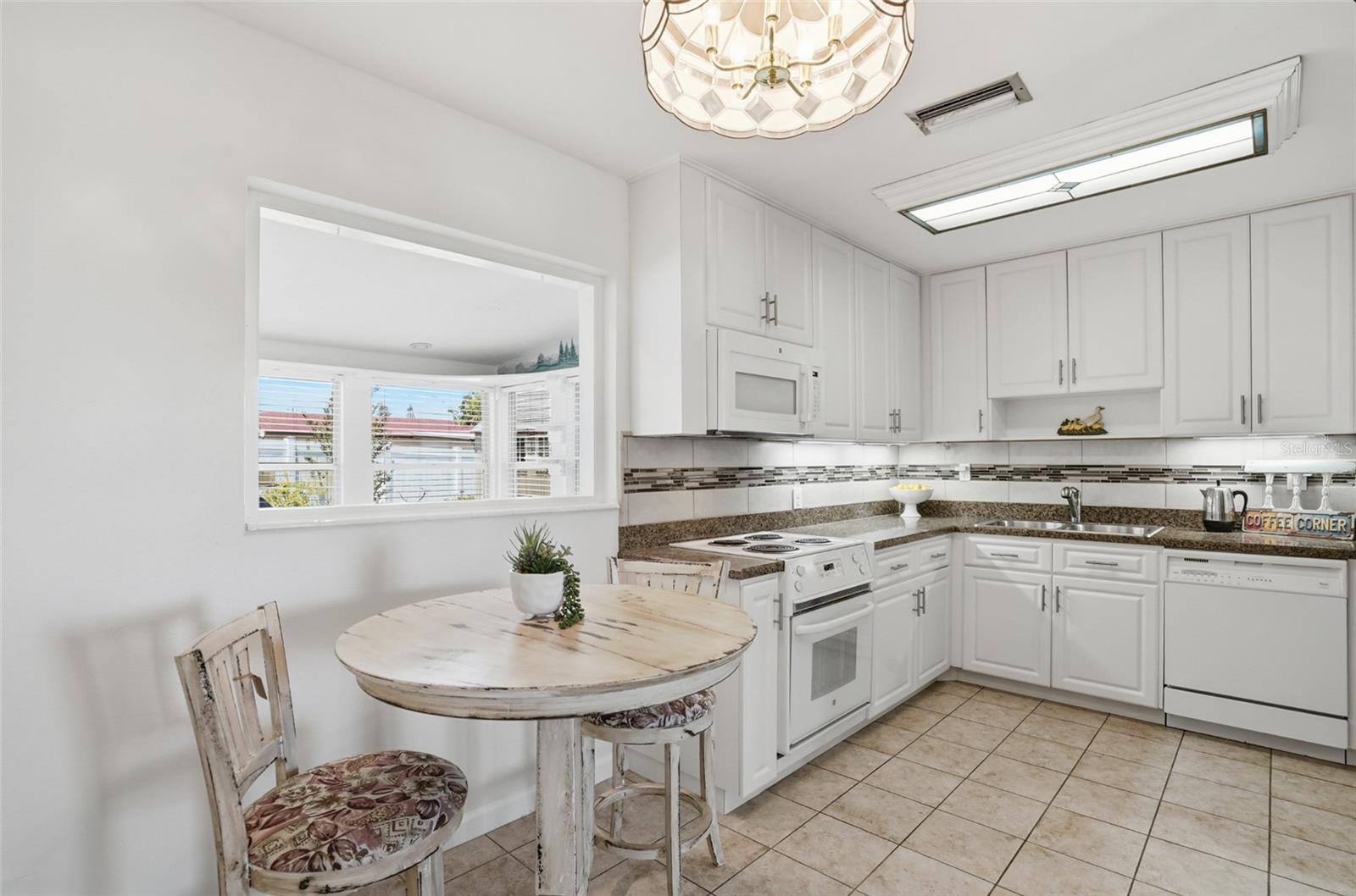 5941 49TH AVE N, KENNETH CITY, FL, 33709