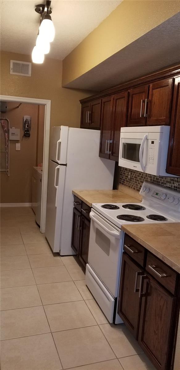 5542 METROWEST BLVD #106, ORLANDO, FL, 32811