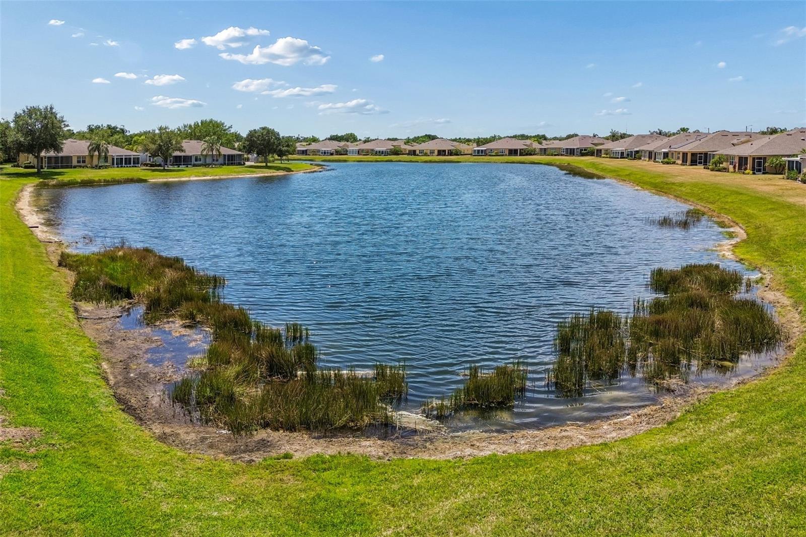 2011 SIFIELD GREENS WAY #2011, SUN CITY CENTER, FL, 33573