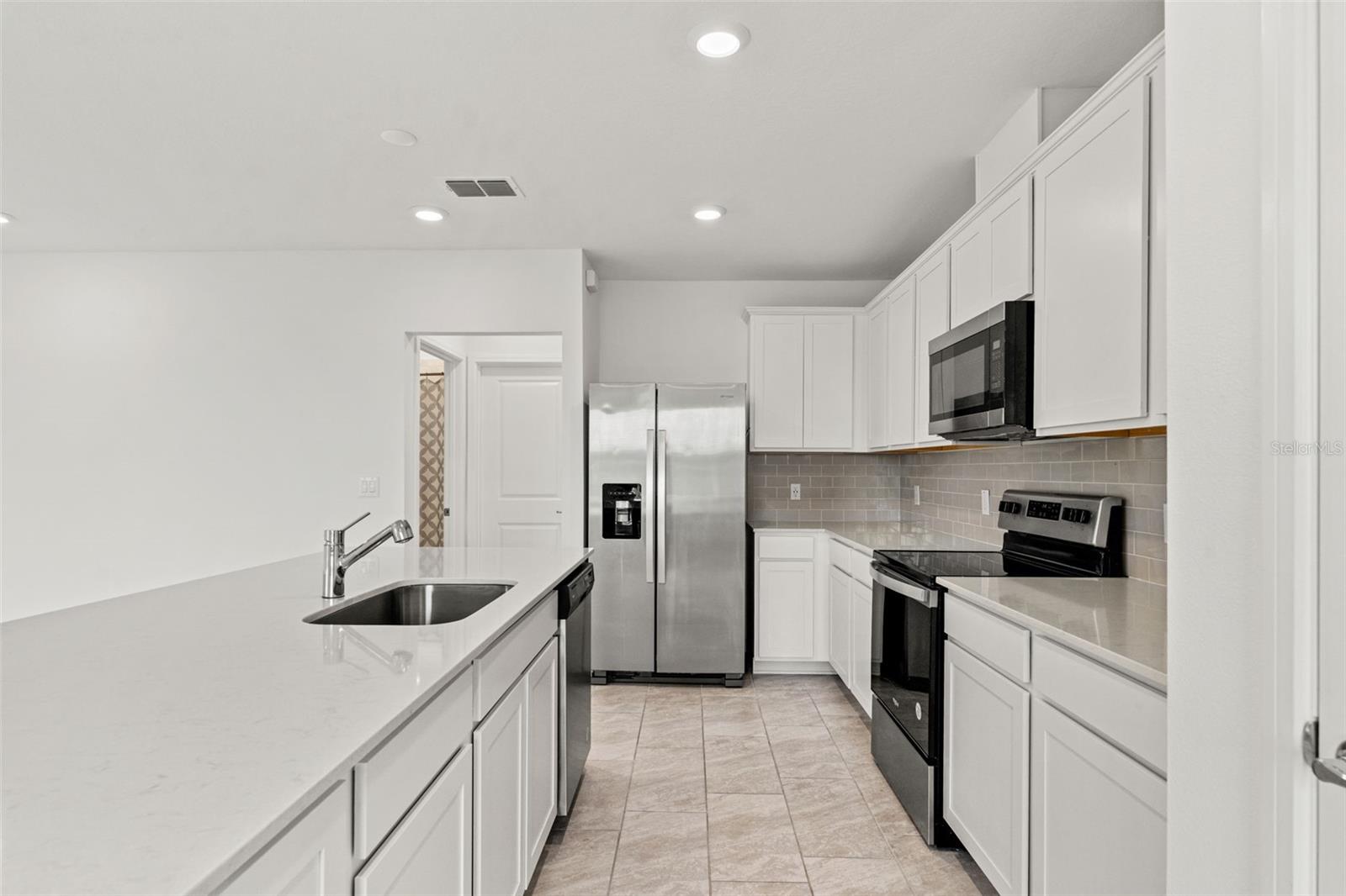 9058 RALLY SPRING LOOP, WESLEY CHAPEL, FL, 33545