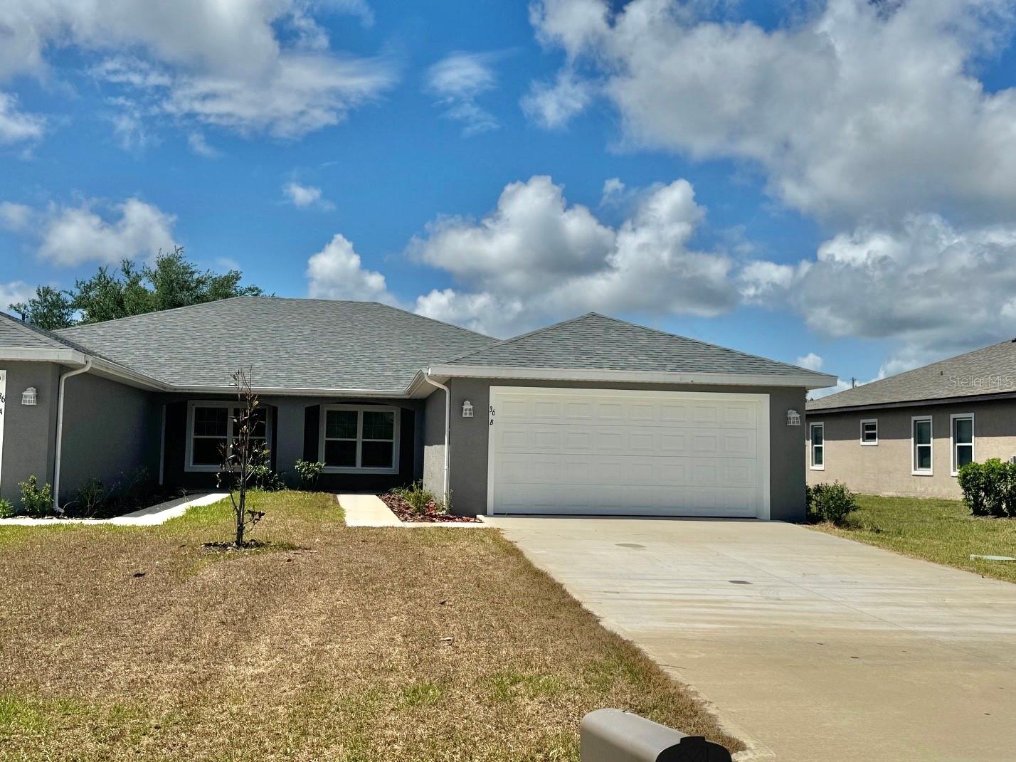 36 LOUISBURG LN #A & B, PALM COAST, FL, 32137