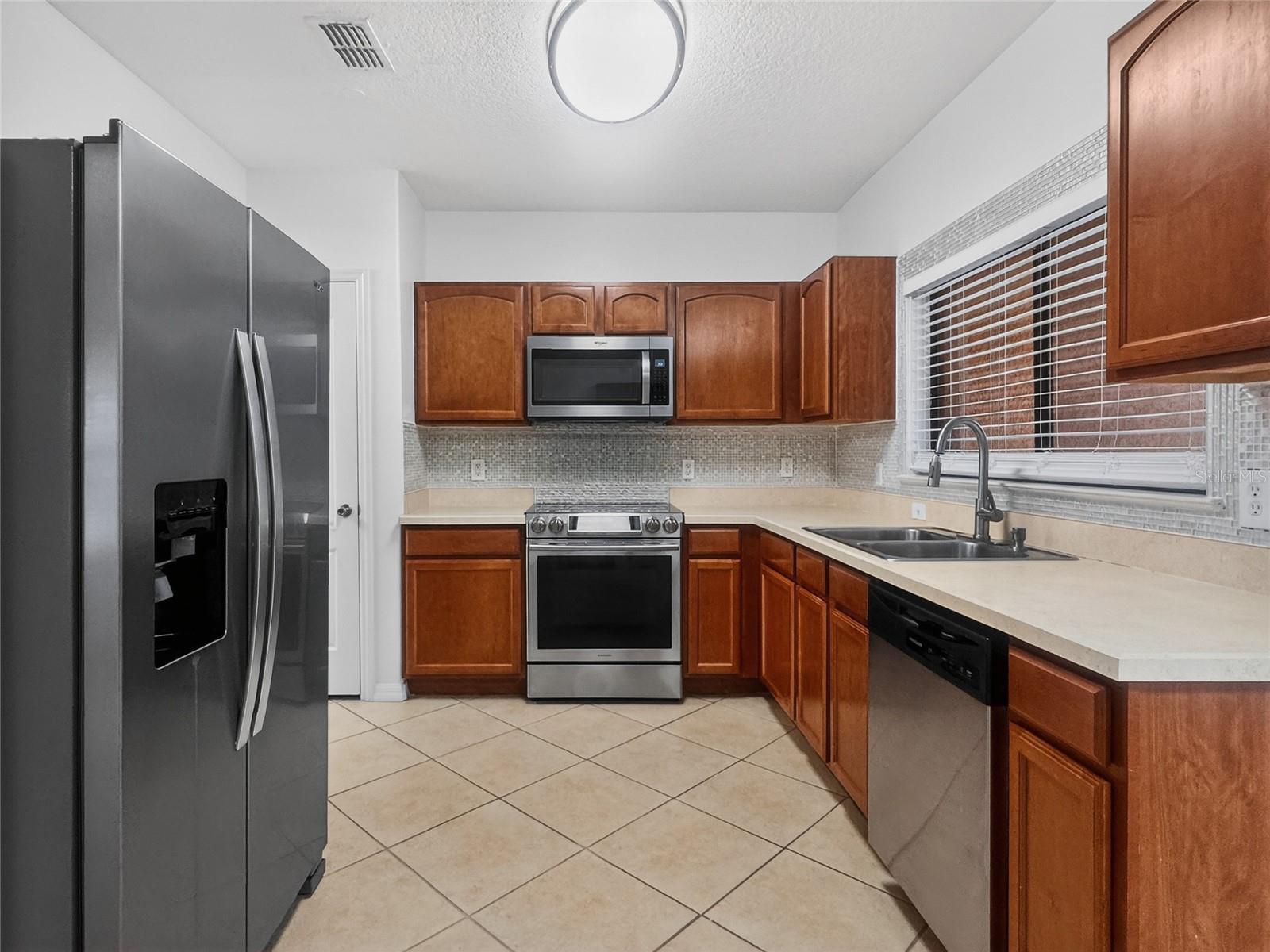 9599 BACCHUS TRL, ORLANDO, FL, 32829
