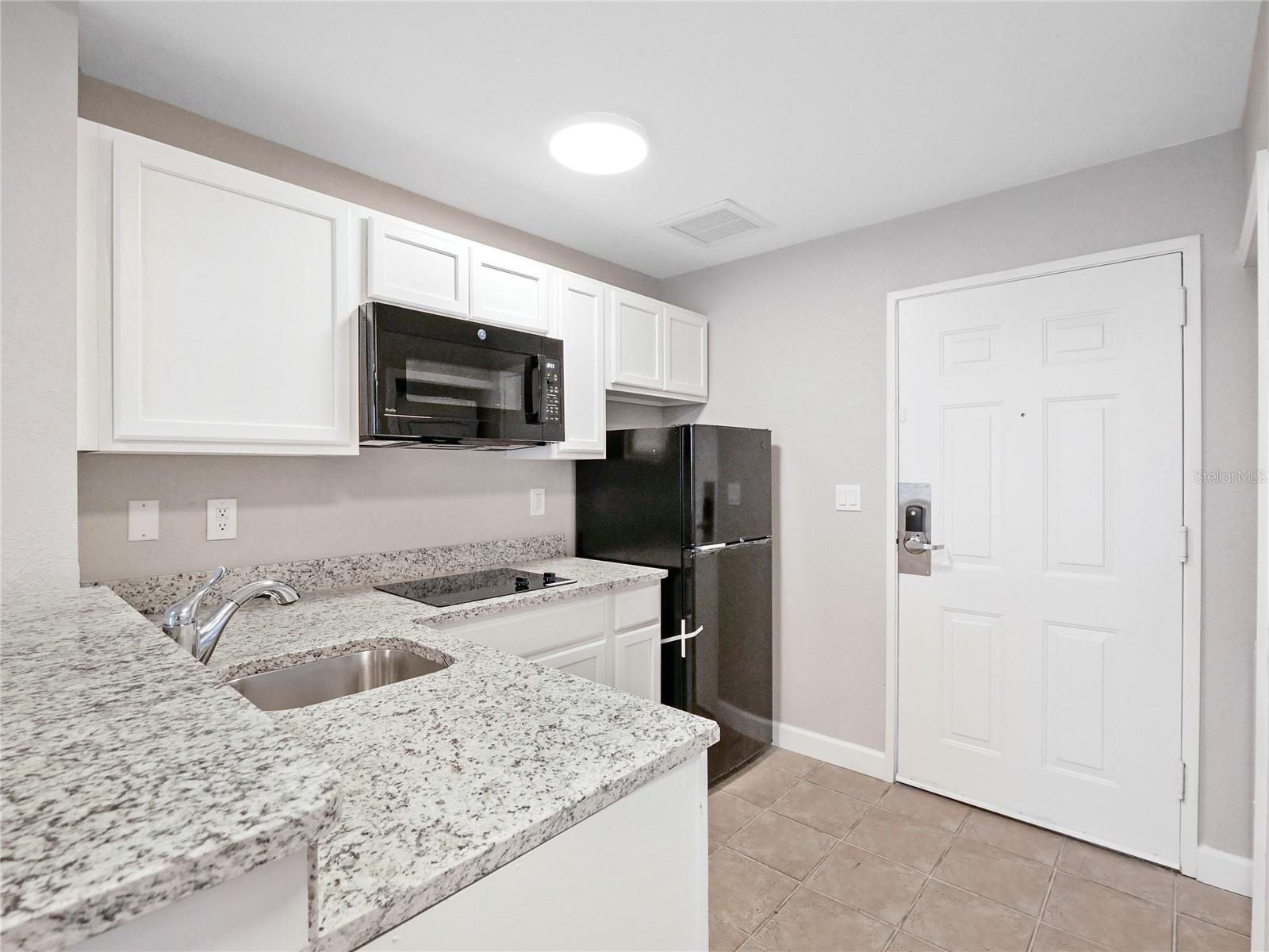 7503 ATLANTIS WAY #J102, KISSIMMEE, FL, 34747