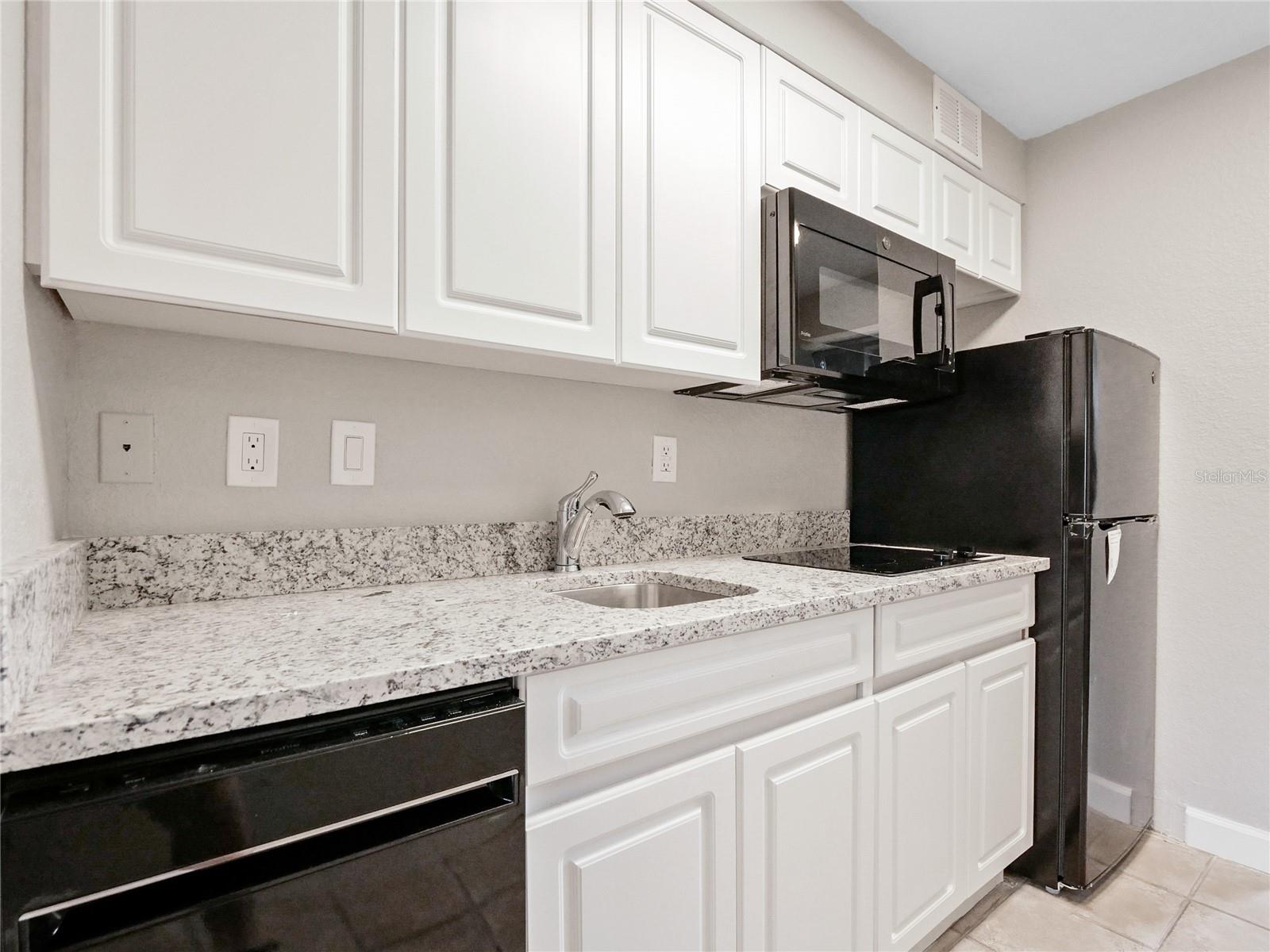 7503 ATLANTIS WAY #J102, KISSIMMEE, FL, 34747