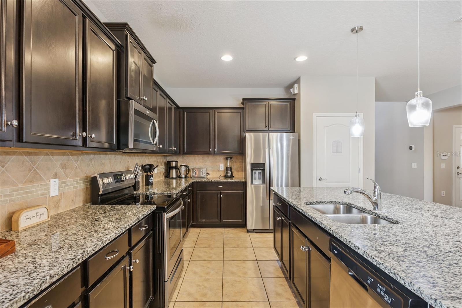 8875 QIN LOOP, KISSIMMEE, FL, 34747
