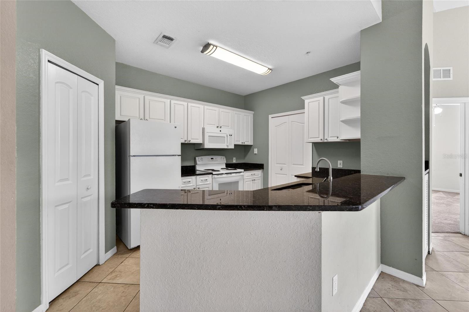 5611 LEGACY CRESCENT PL #304, RIVERVIEW, FL, 33578