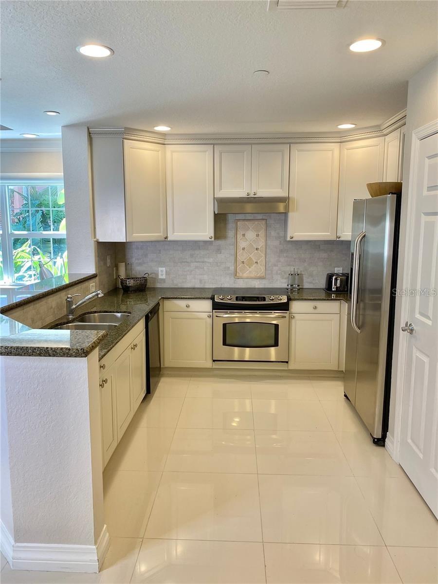 7652 WHISPER WAY #104, REUNION, FL, 34747