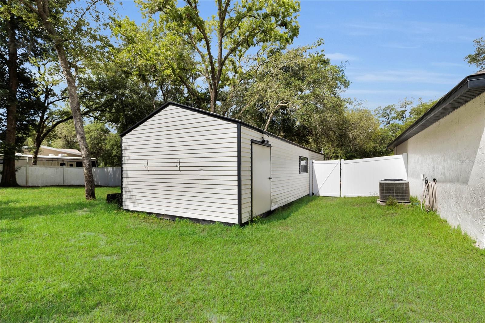 40206 PALM ST, LADY LAKE, FL, 32159