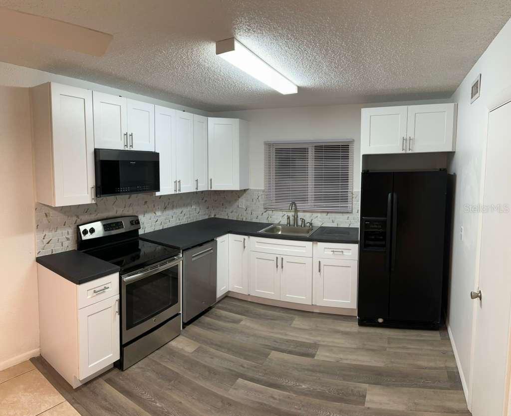 1000 LAKE OF THE WOODS BLVD #205H, FERN PARK, FL, 32730