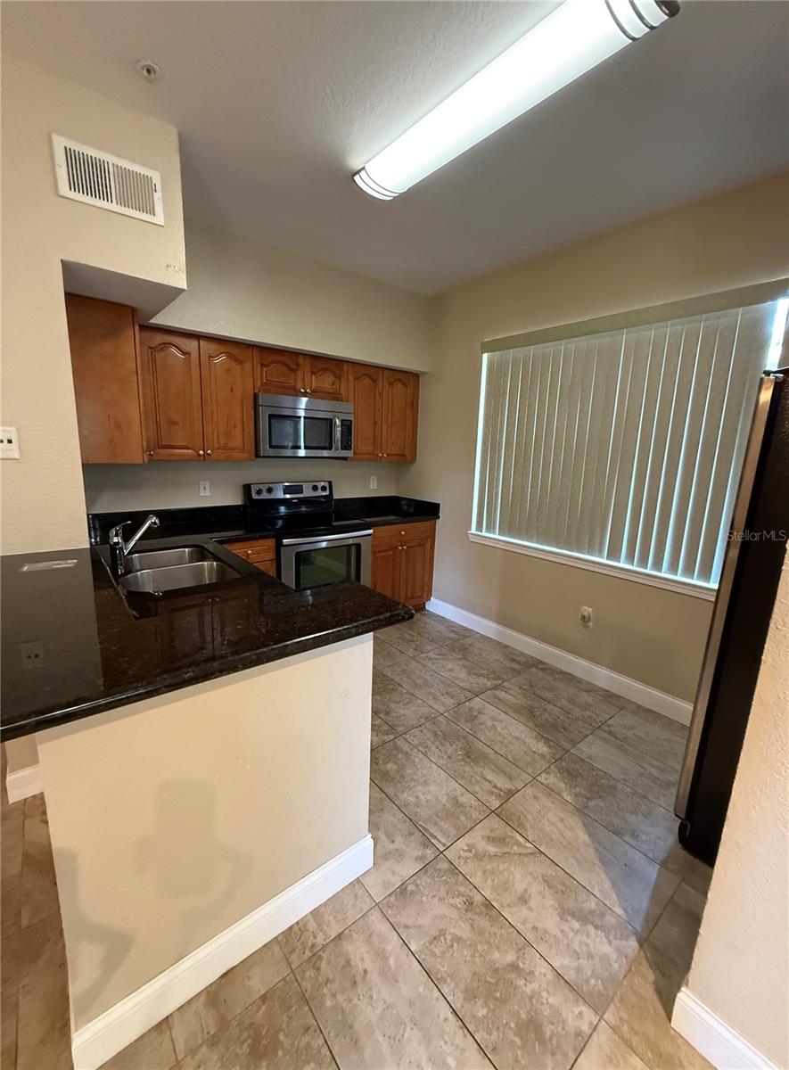 2668 ROBERT TRENT JONES DR #410, ORLANDO, FL, 32835