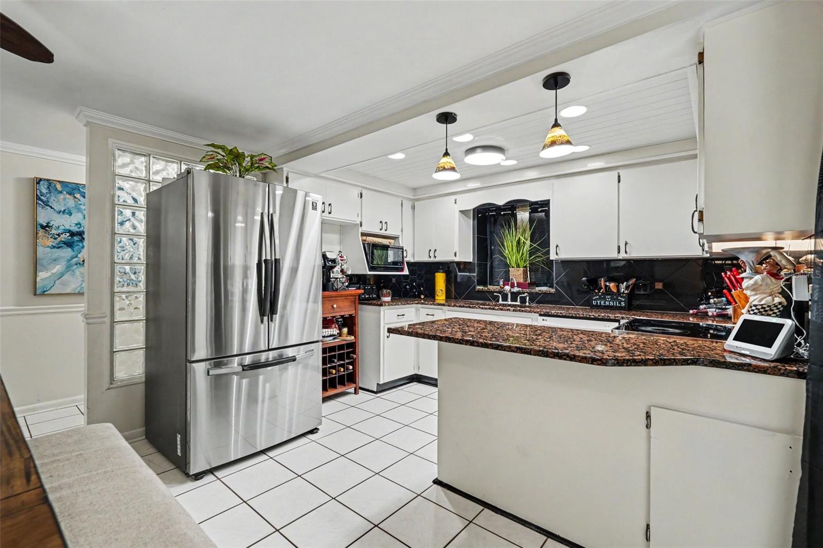 8115 N OLA AVE, TAMPA, FL, 33604