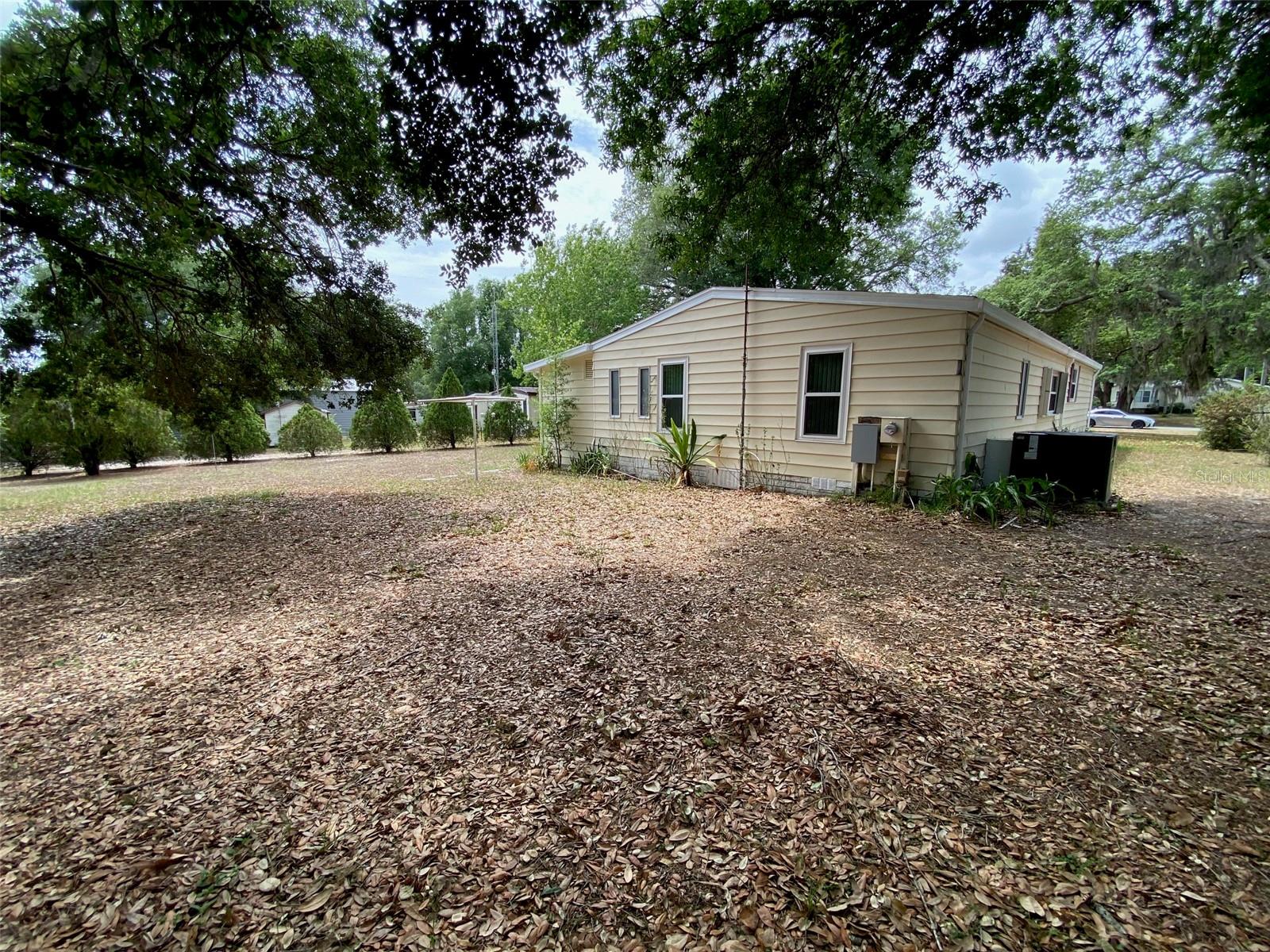 13957 COUNTY ROAD 109D, LADY LAKE, FL, 32159