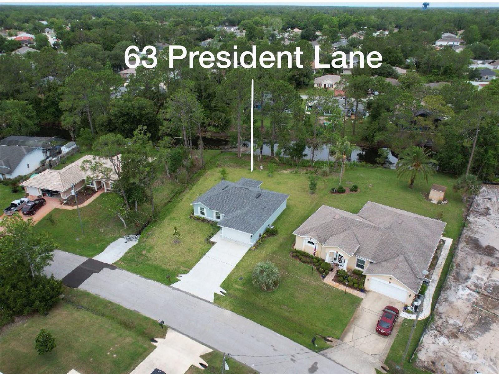 63 PRESIDENT LN, PALM COAST, FL, 32164