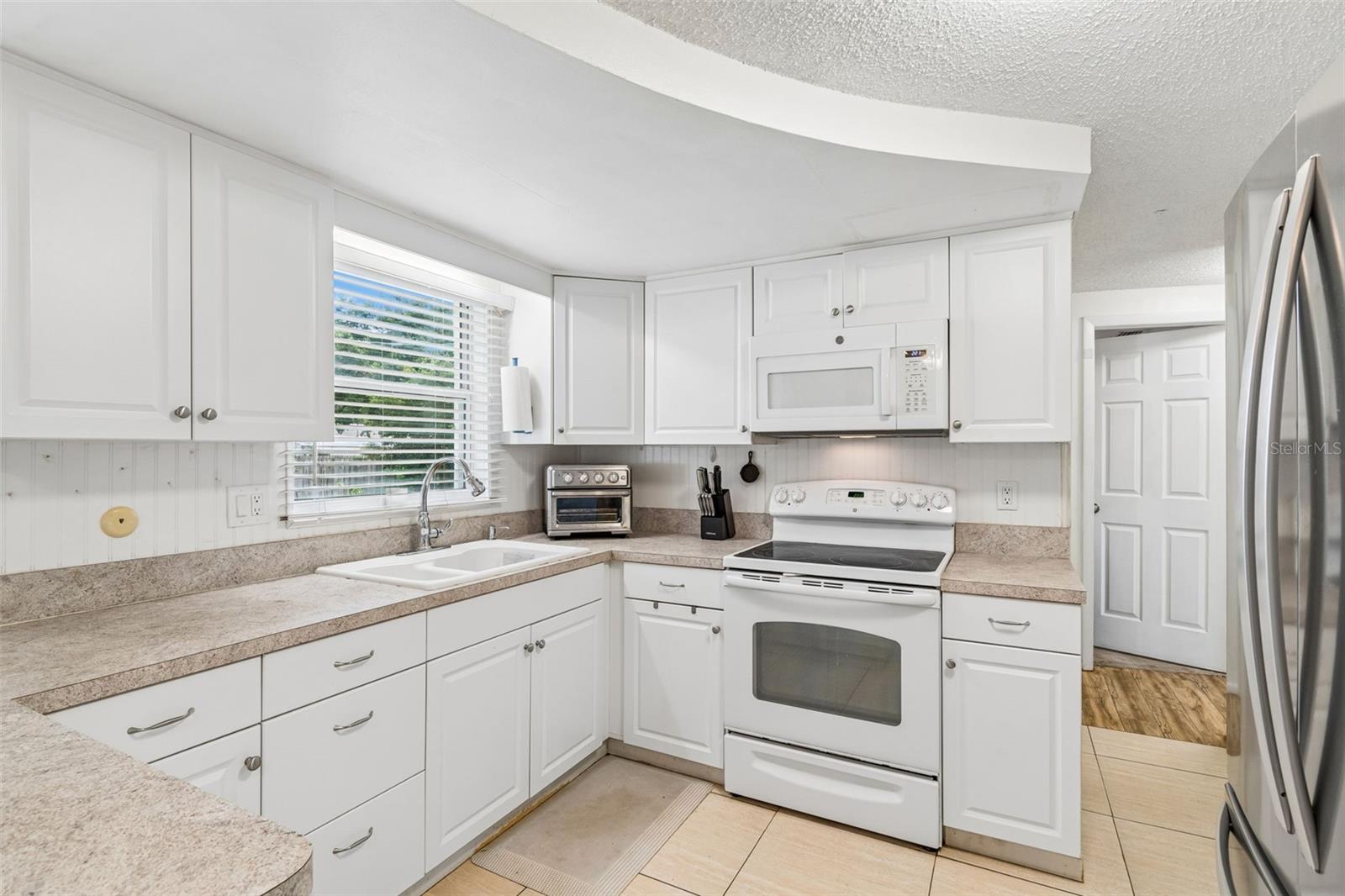 2440 ARCADIA RD, HOLIDAY, FL, 34690