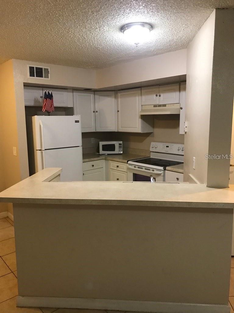 4572 COMMANDER DR #1213, ORLANDO, FL, 32822
