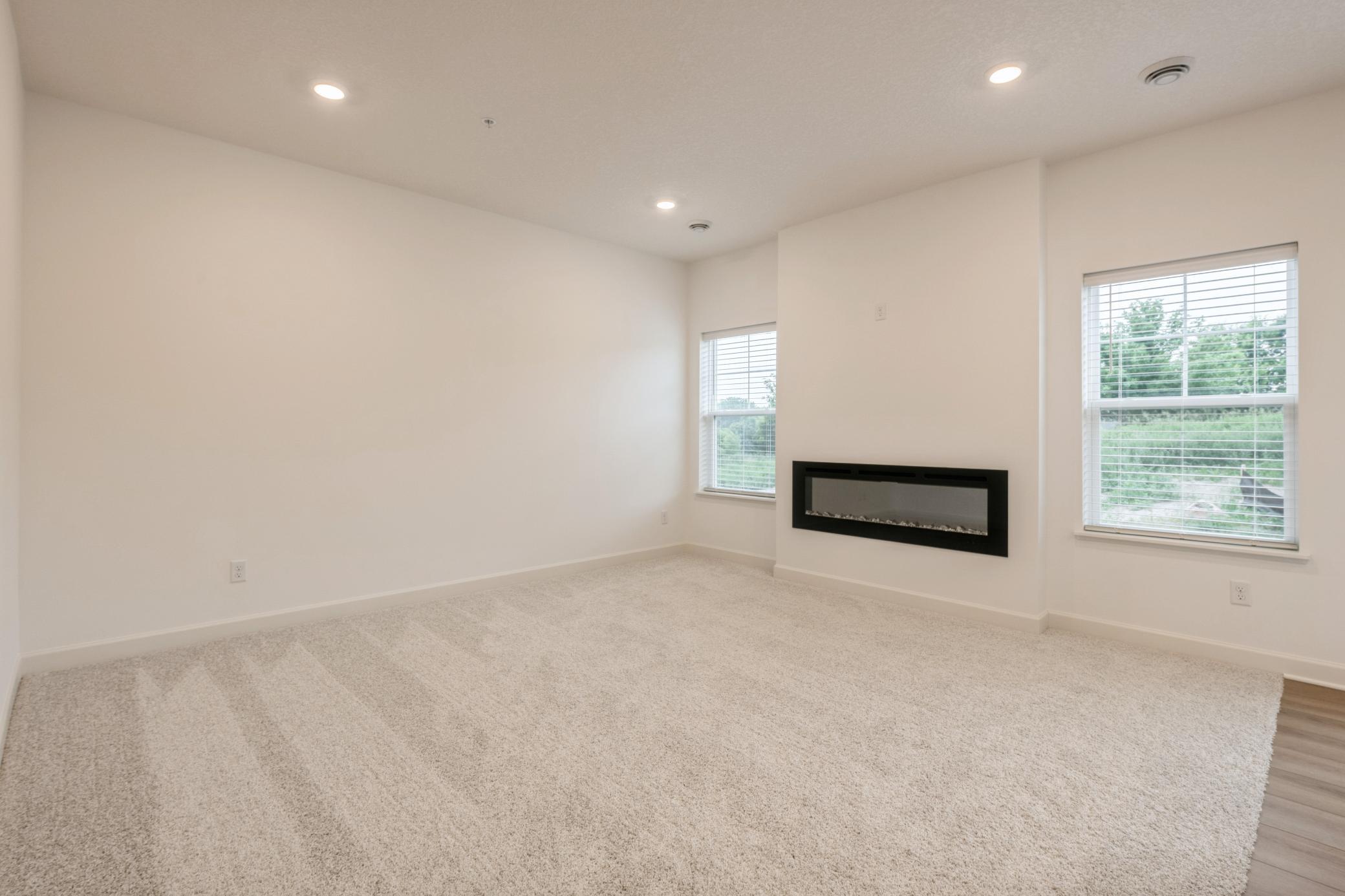 (Photo of a similar home, actual homes finishes will vary) This beautiful great room is both cozy and contemporary!