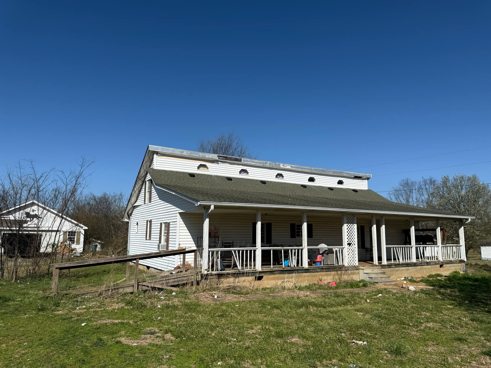 Note: a mobile home exists on the property but is sold 'as-is' with no value assigned.