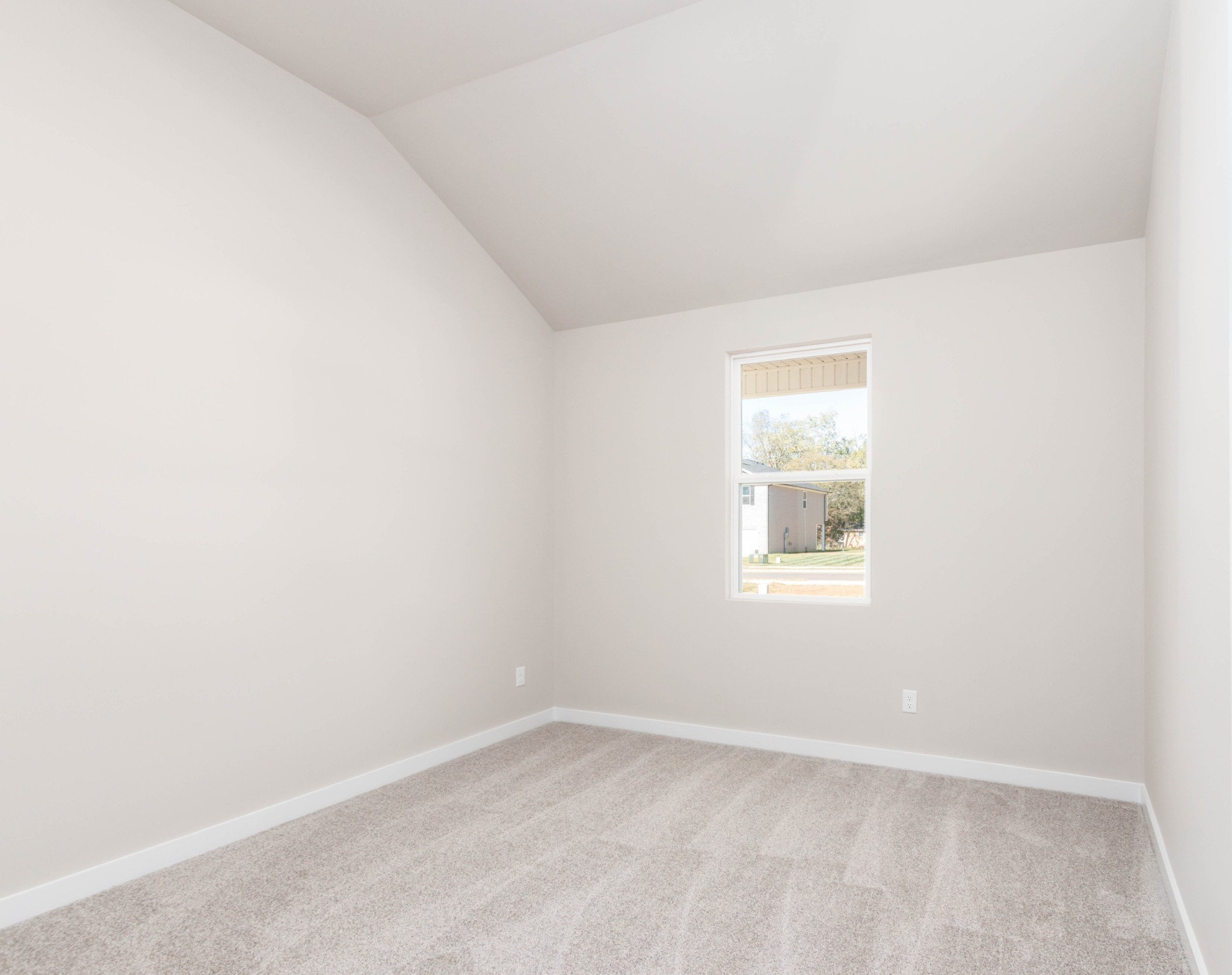 12-Ft x 11-Ft Bedroom #3 with Vaulted Ceilings. Pictures are of a similar floorplan that was built previously. Representation ONLY. Buyer/Buyer's Agent to verify selections.