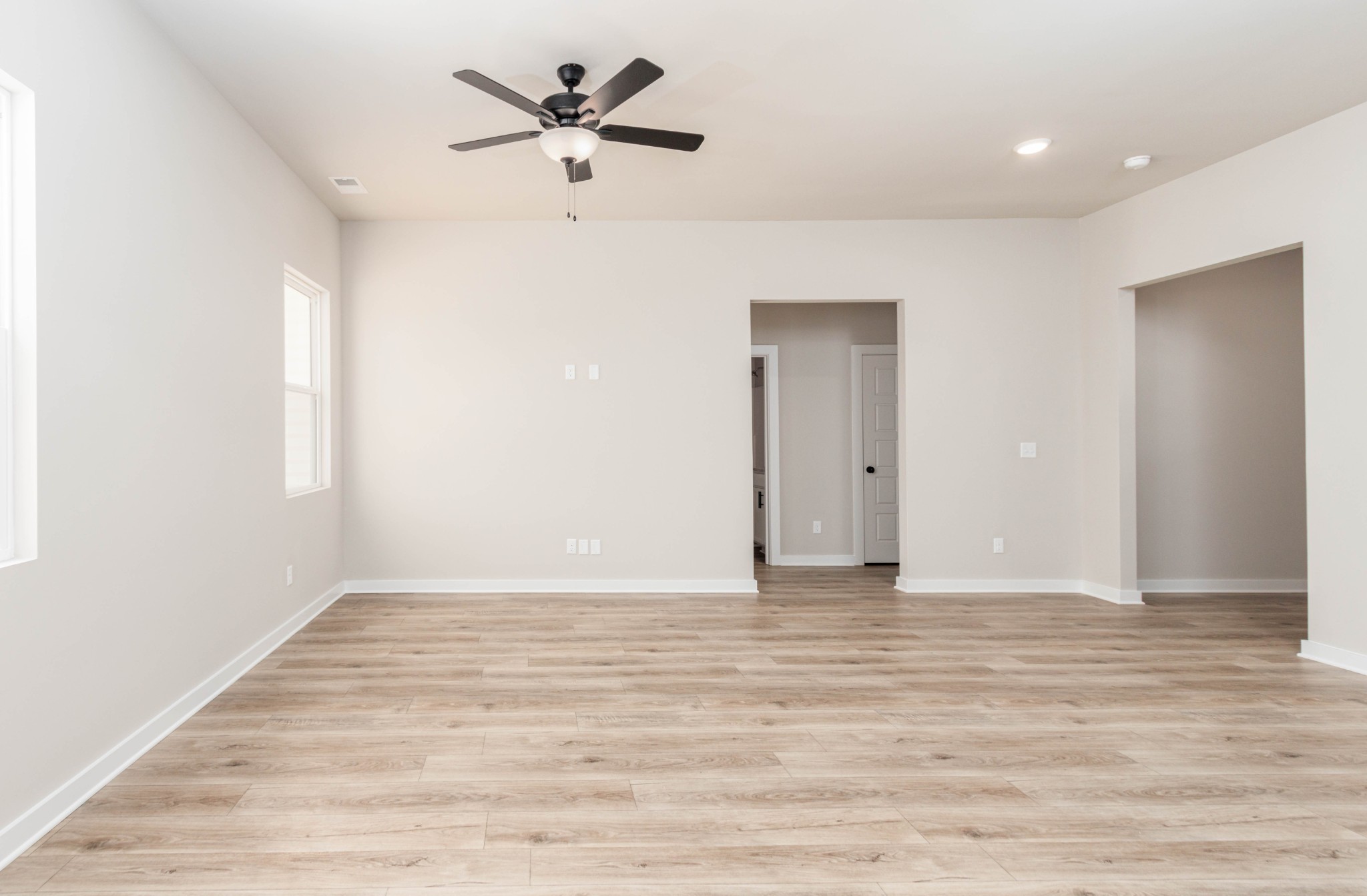 Foyer (Right), Downstairs Hall (Middle). Pictures are of a similar floorplan that was built previously. Representation ONLY. Buyer/Buyer's Agent to verify selections.
