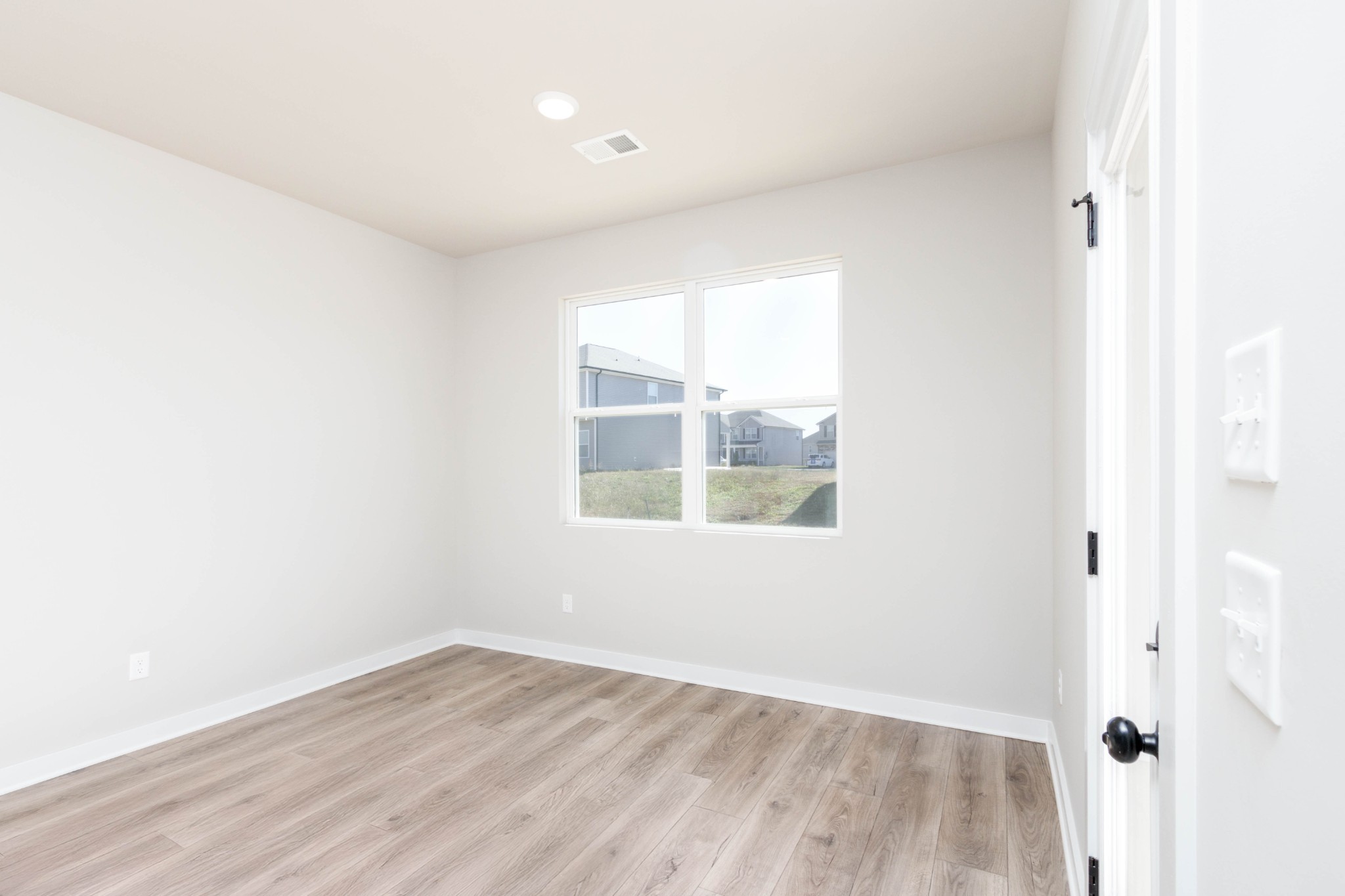 Dining Area with access to the Covered Back Porch (Right). Pictures are of a similar floorplan that was built previously. Representation ONLY. Buyer/Buyer's Agent to verify selections.