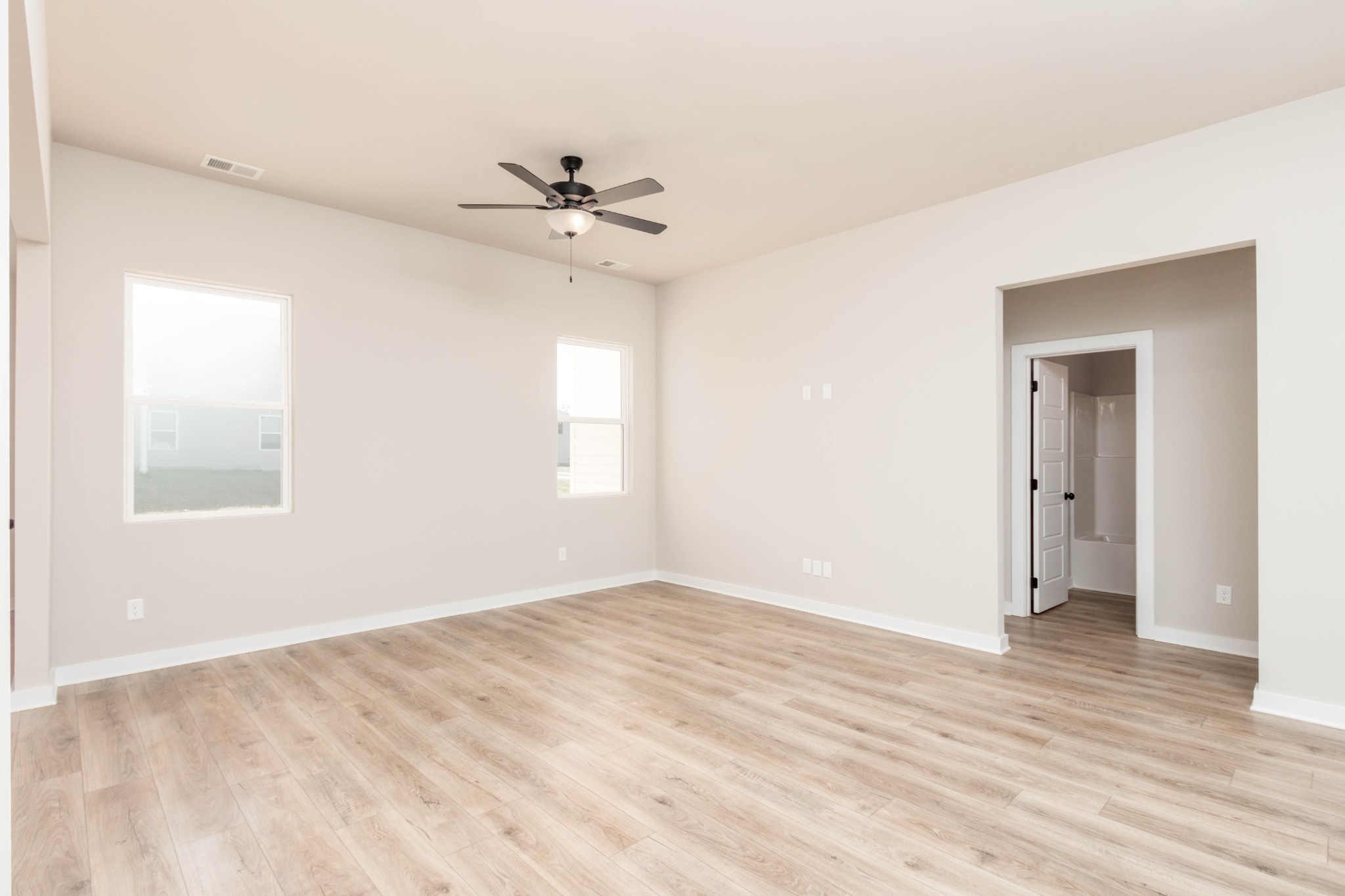Hall (Right) Leads to two Guest Bedrooms and the Guest Full Bathroom. Pictures are of a similar floorplan that was built previously. Representation ONLY. Buyer/Buyer's Agent to verify selections.