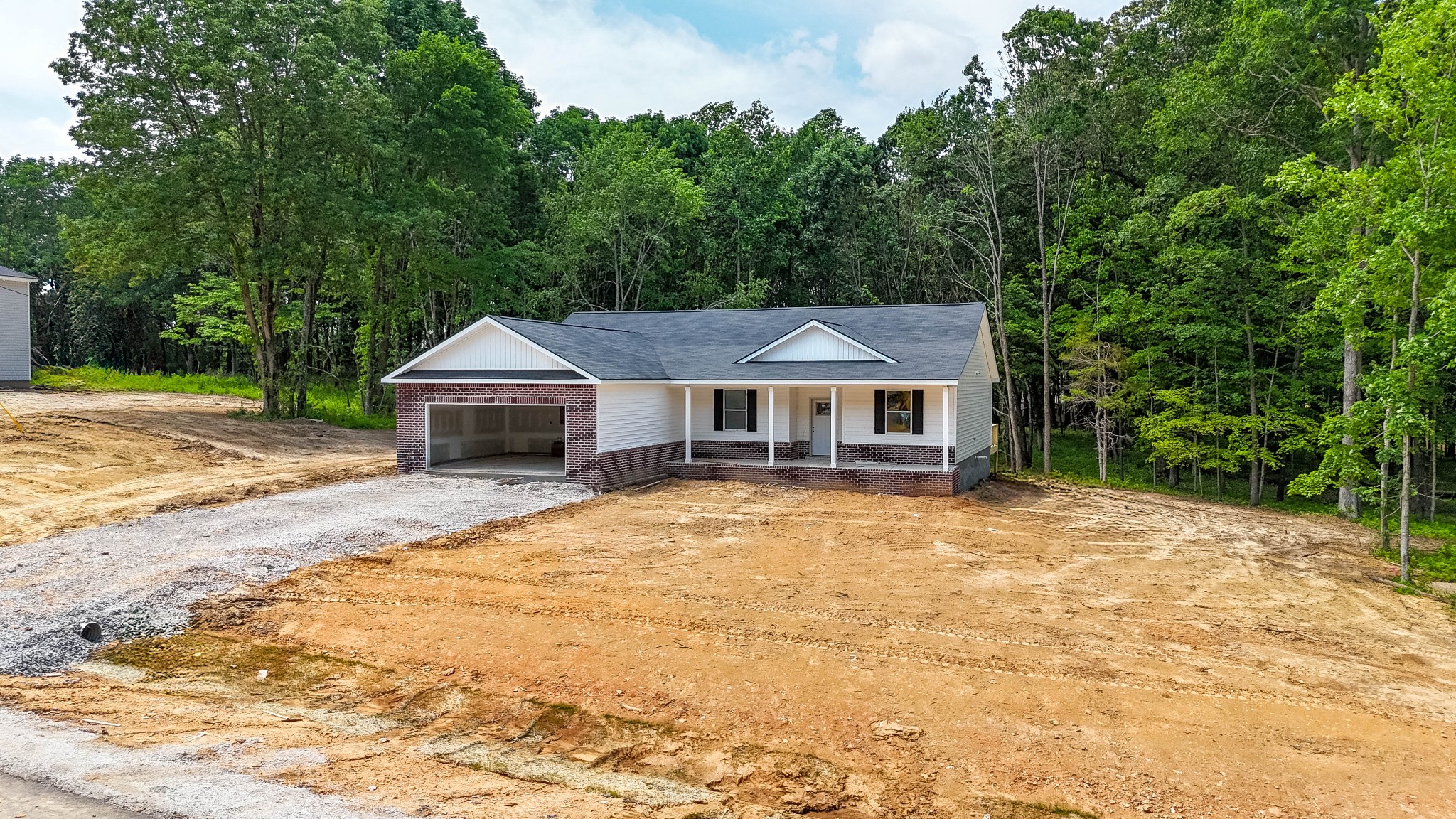 Gorgeous wooded homesite, driveway will be concrete