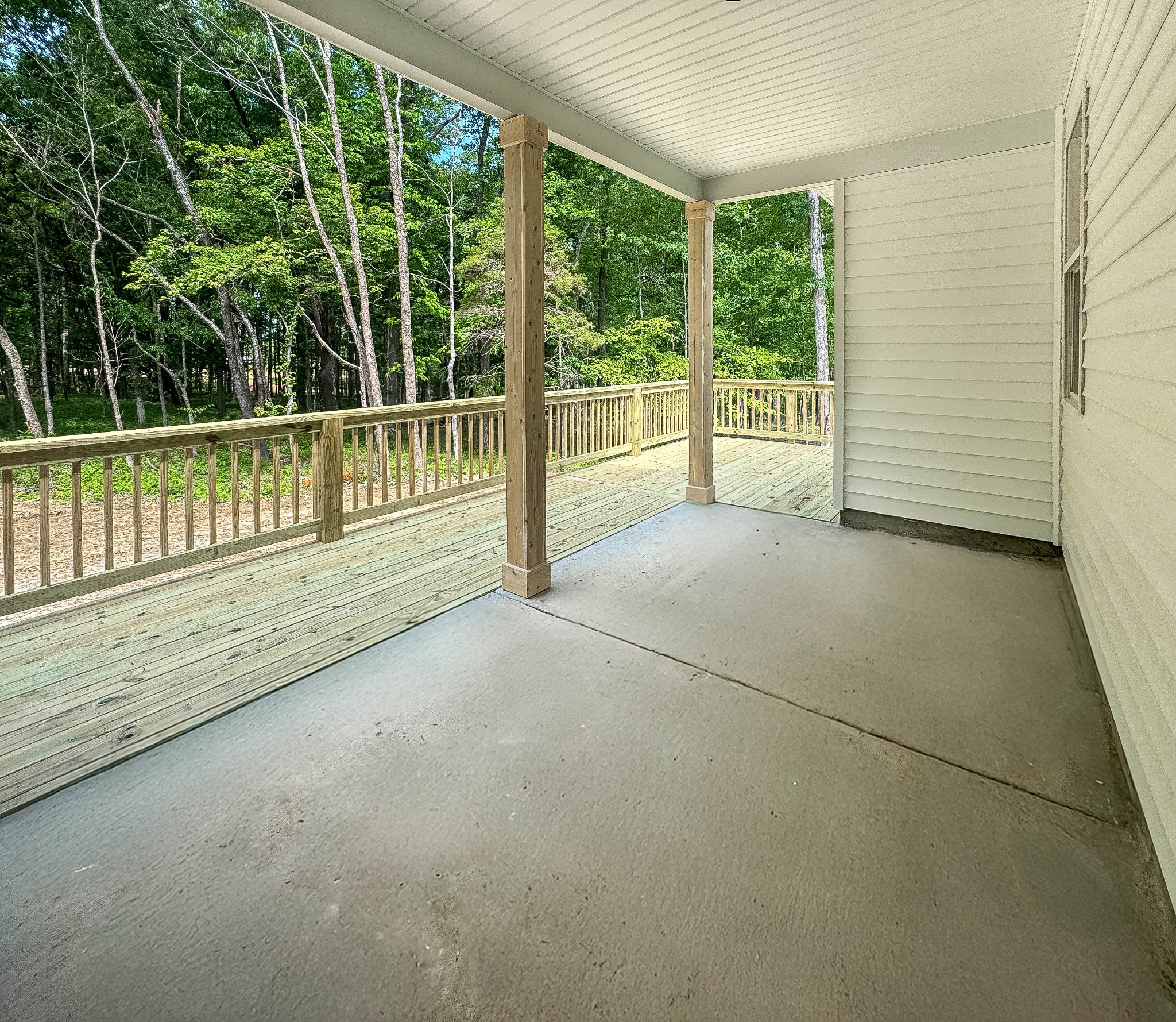 Incredible Covered Back-Porch with a GIANT Back Deck!