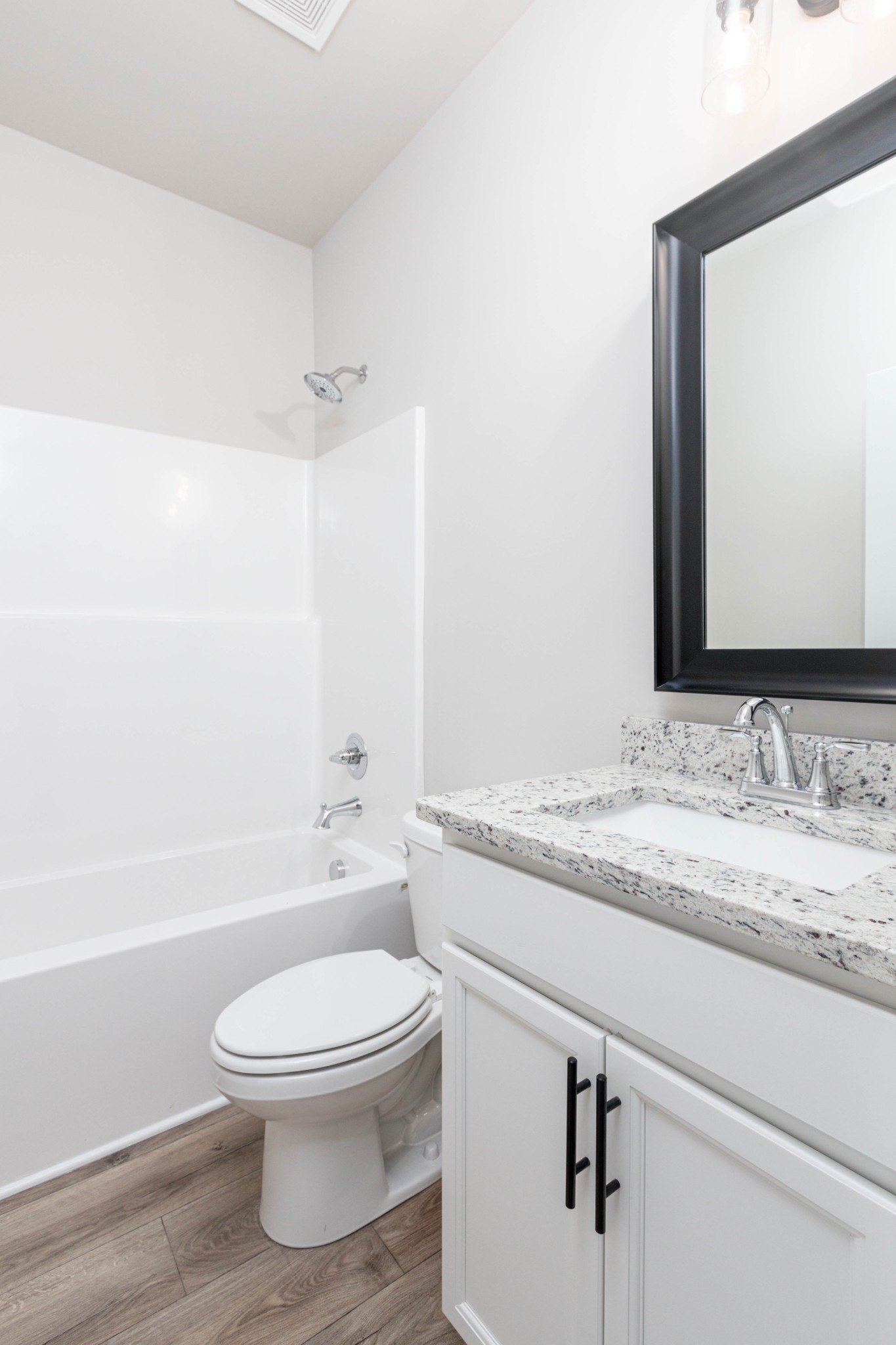 Full Bathroom with Granite Countertops & Tub/Shower Combo. Pictures are of a similar floorplan that was built previously. Representation ONLY. Buyer/Buyer's Agent to verify selections.