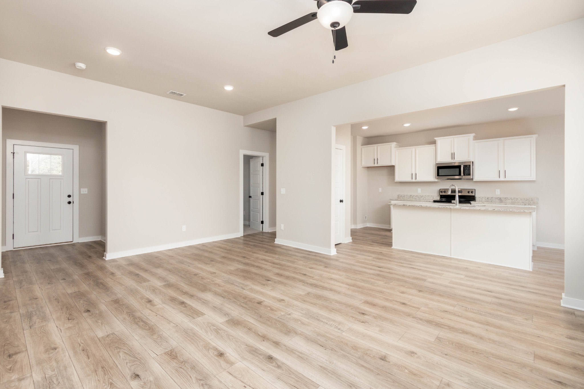 Foyer/Front Door (Left), Bedroom #3 (Middle). Pictures are of a similar floorplan that was built previously. Representation ONLY. Buyer/Buyer's Agent to verify selections.