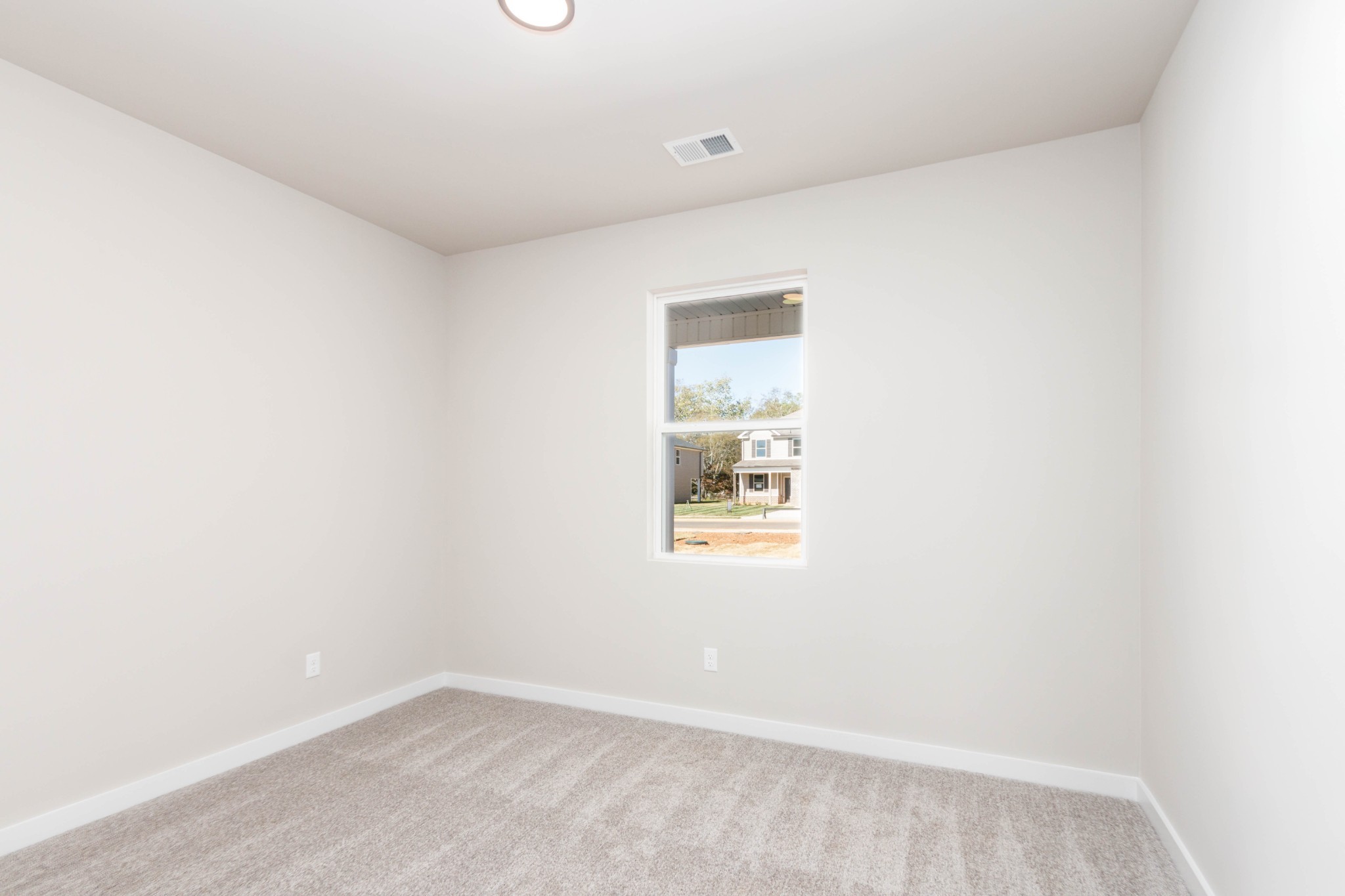 12-Ft x 10-Ft Bedroom #2. Pictures are of a similar floorplan that was built previously. Representation ONLY. Buyer/Buyer's Agent to verify selections.