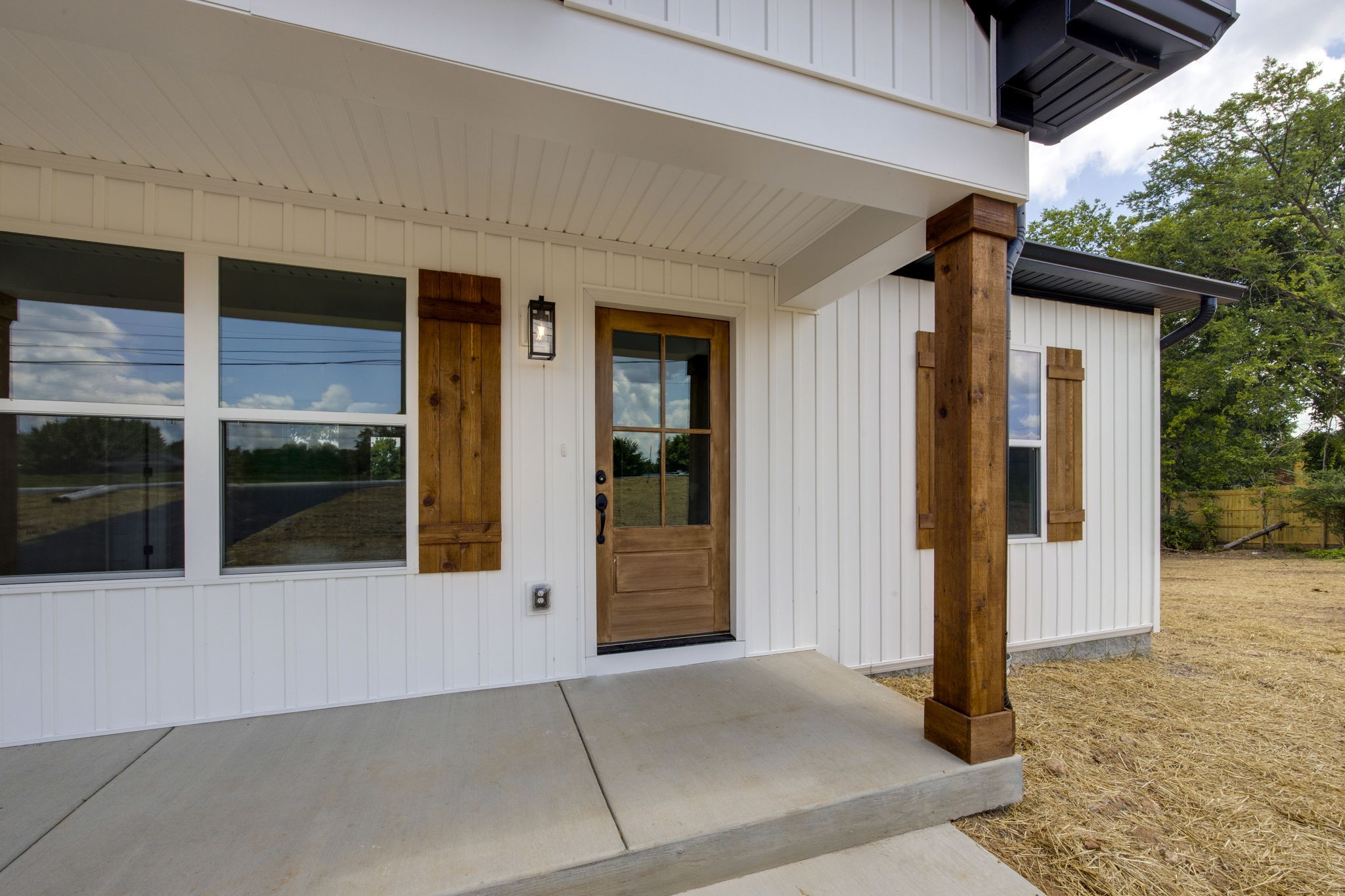 The covered front porch offers shelter from the elements!