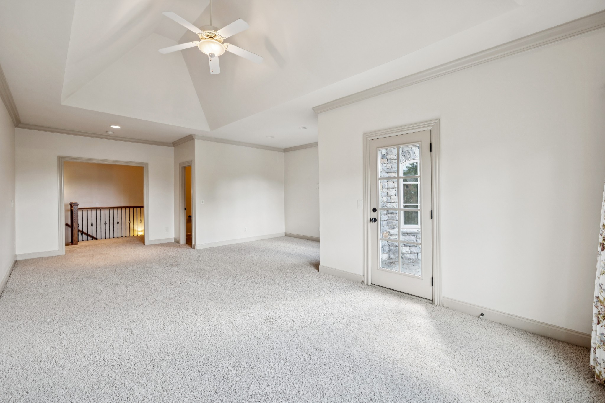 Door leading to upper front balcony off the rec room