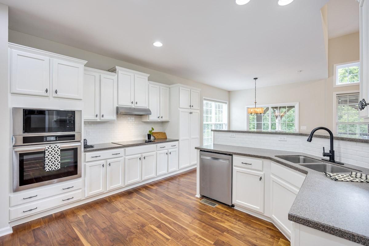 Spacious kitchen with newer appliances. Ample storage.