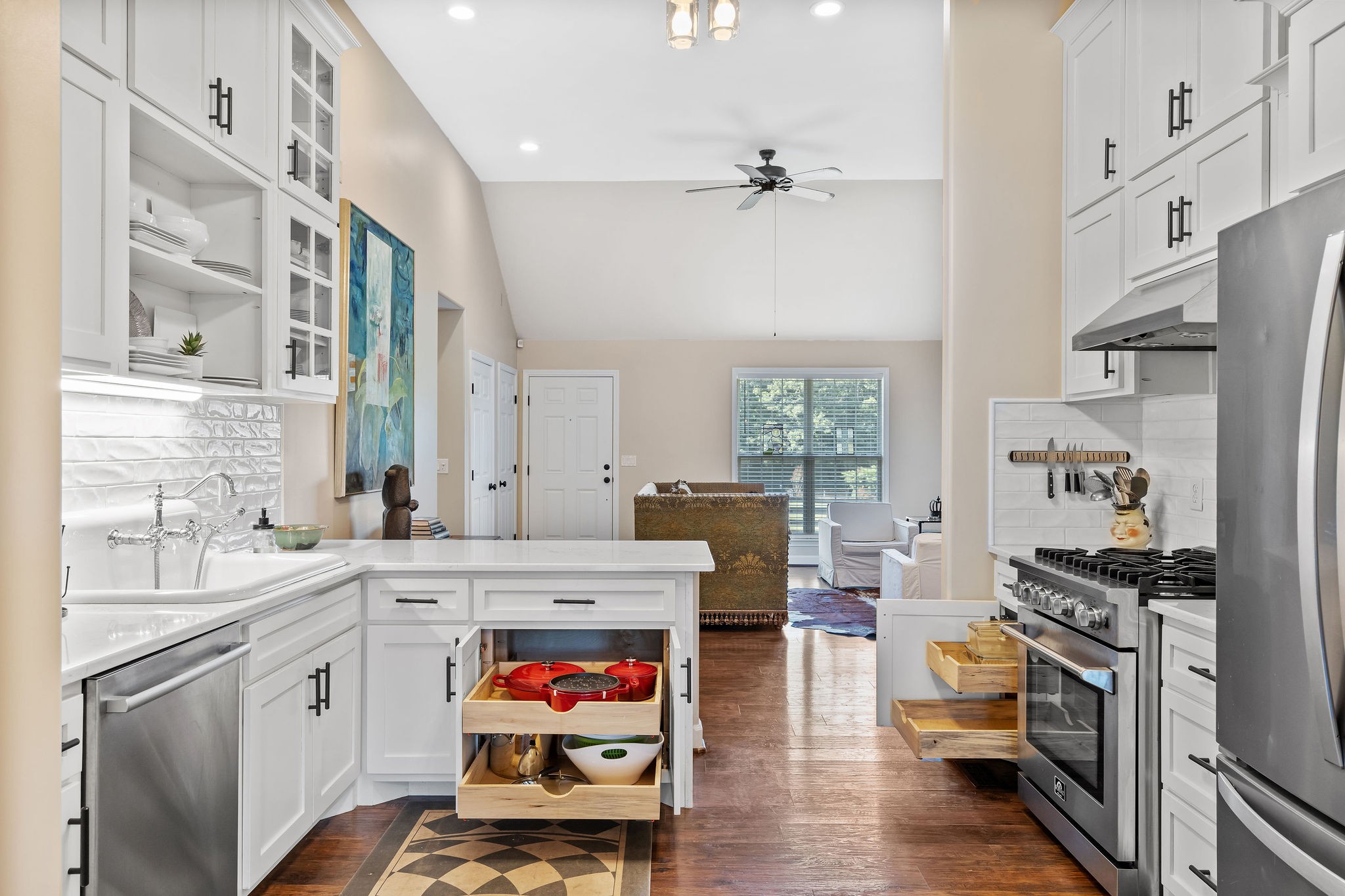 Sliding pullout cabinet drawers add to the convenience and function of this beautiful kitchen. This kitchen has so much storage!