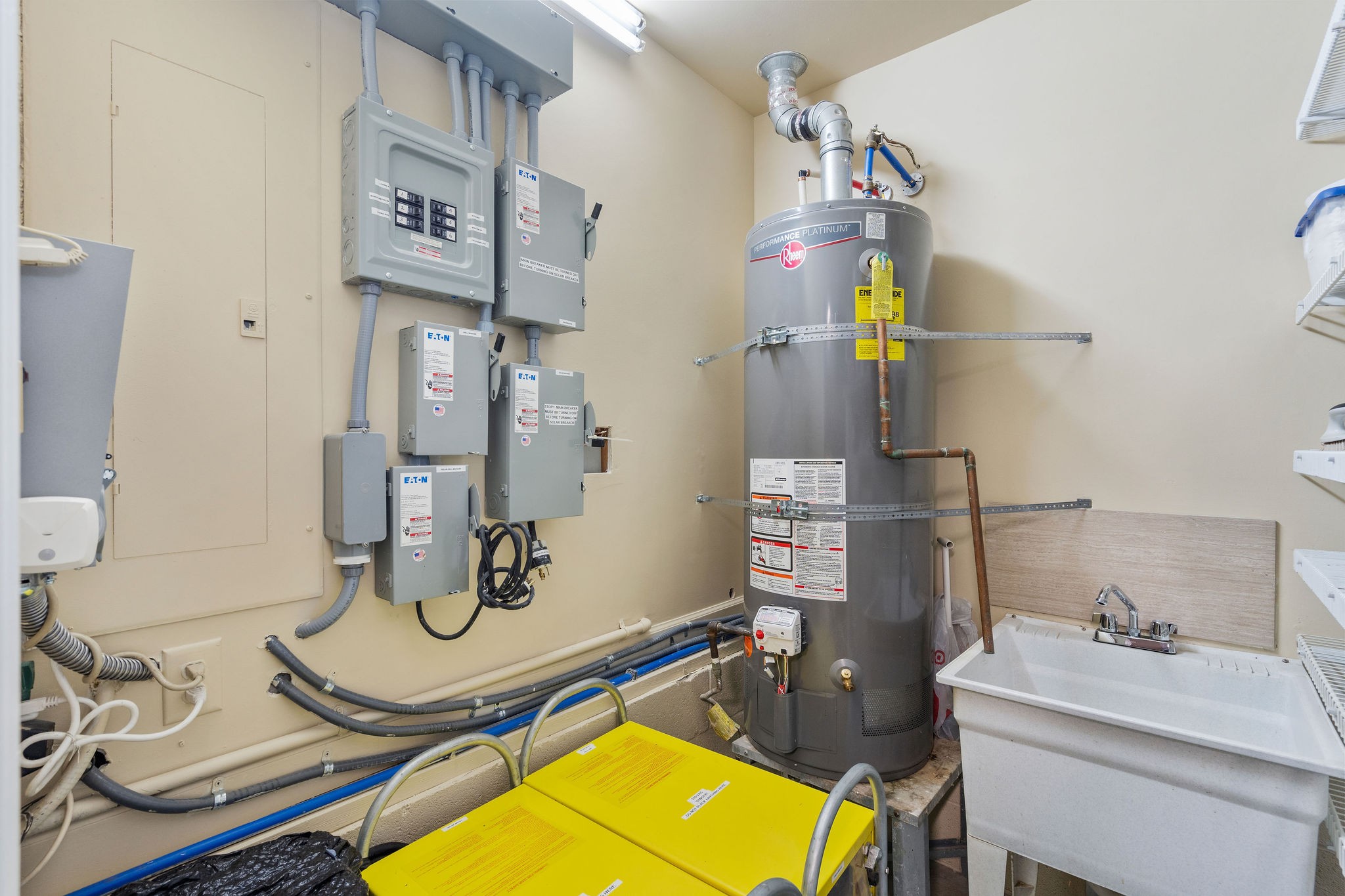 This climate-controlled utility room is located in the garage. It houses separate connections for solar back up, and generator back up which helps in the event that there is a long-term power outage.