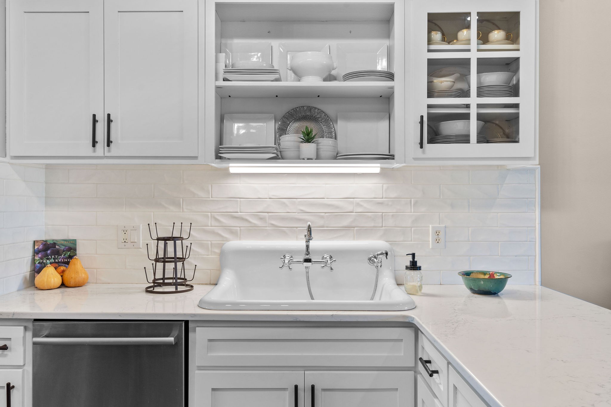 The high back vintage reproduction farmhouse sink is stylish and functional.