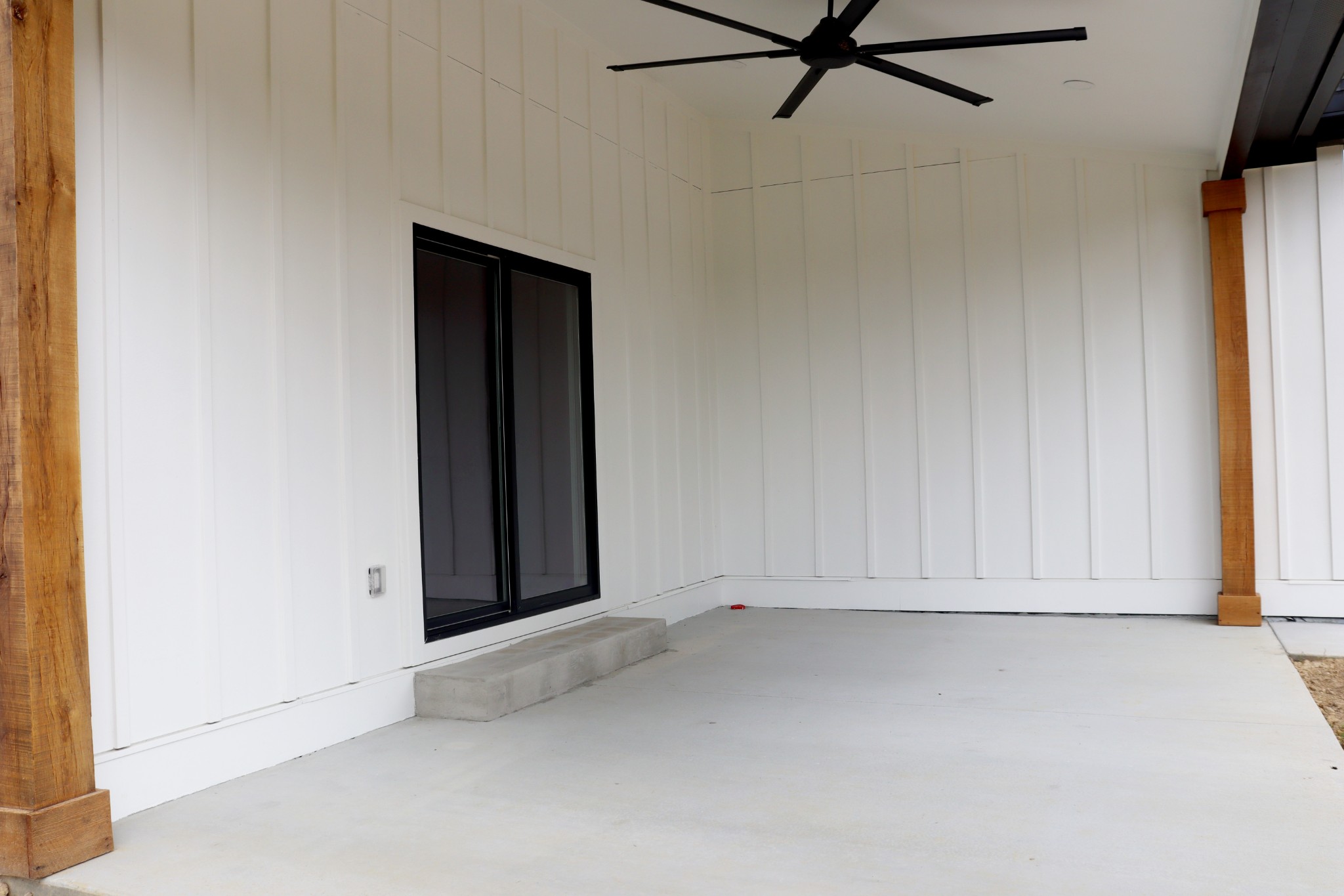 Backyard covered porch is ready for entertaining. 13x20 .