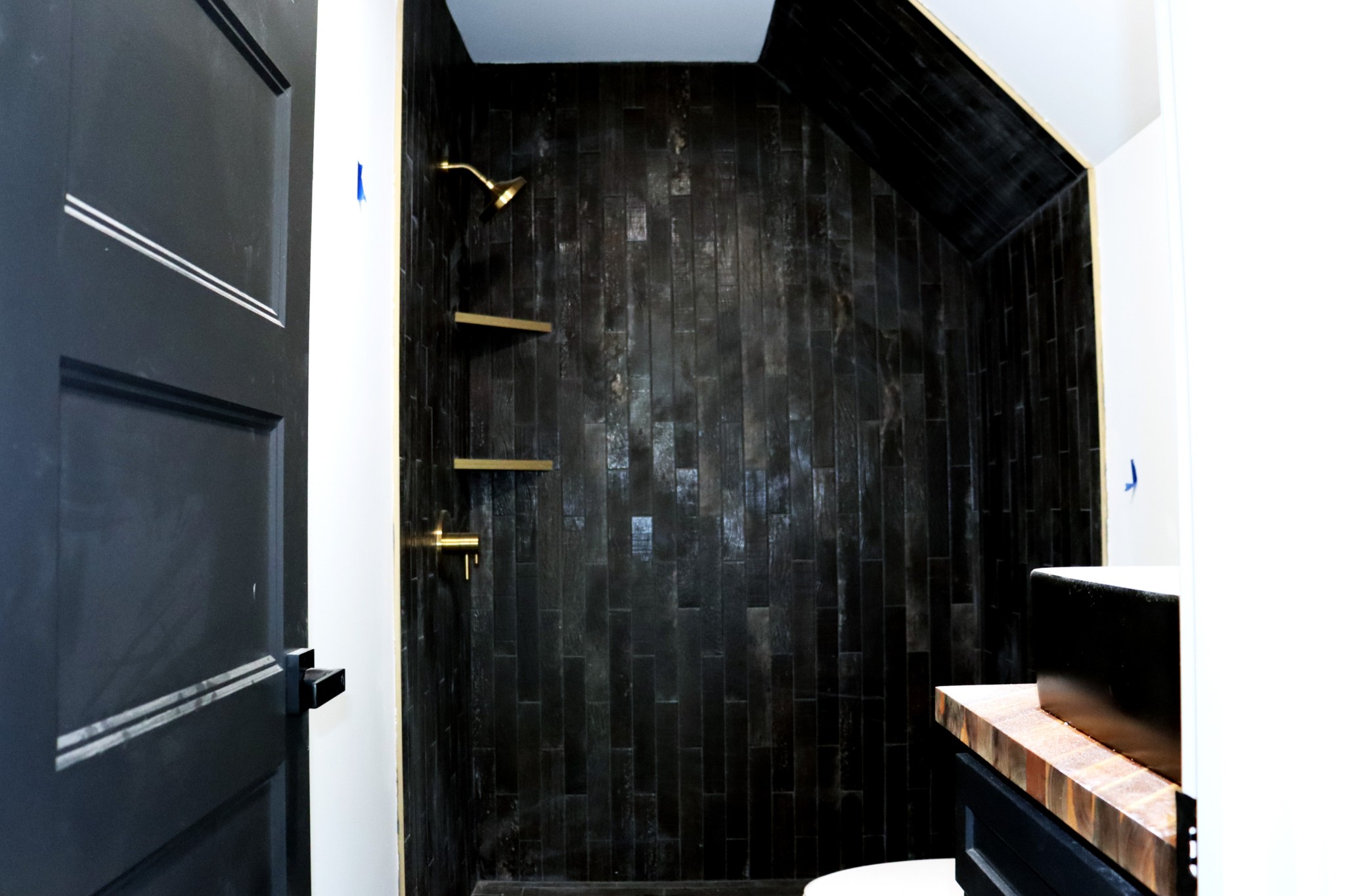 The 9 x 9 guest bathroom accommodates bedrooms 2 and 3.