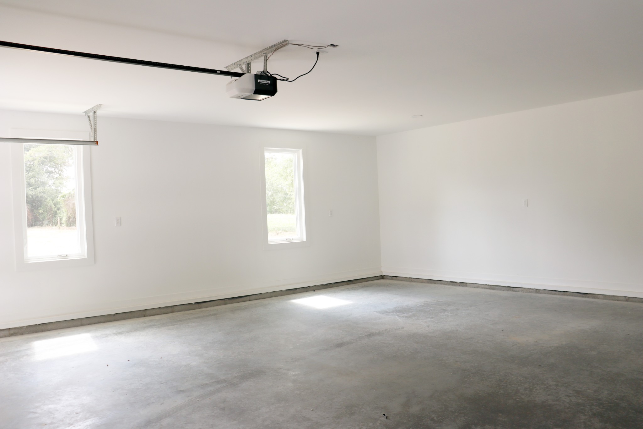 Garage windows provide natural lighting.