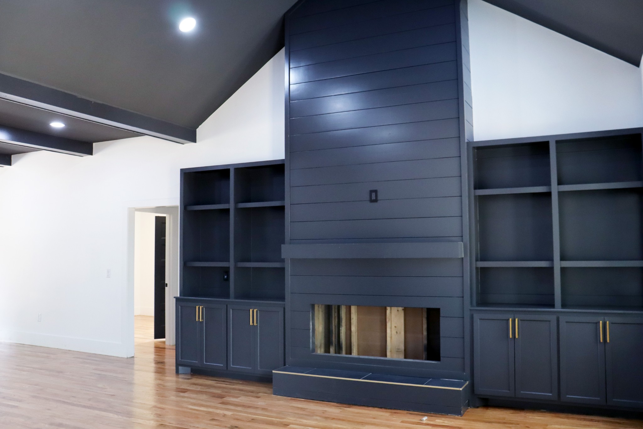 Electric fireplace with built-ins anchor your living room.